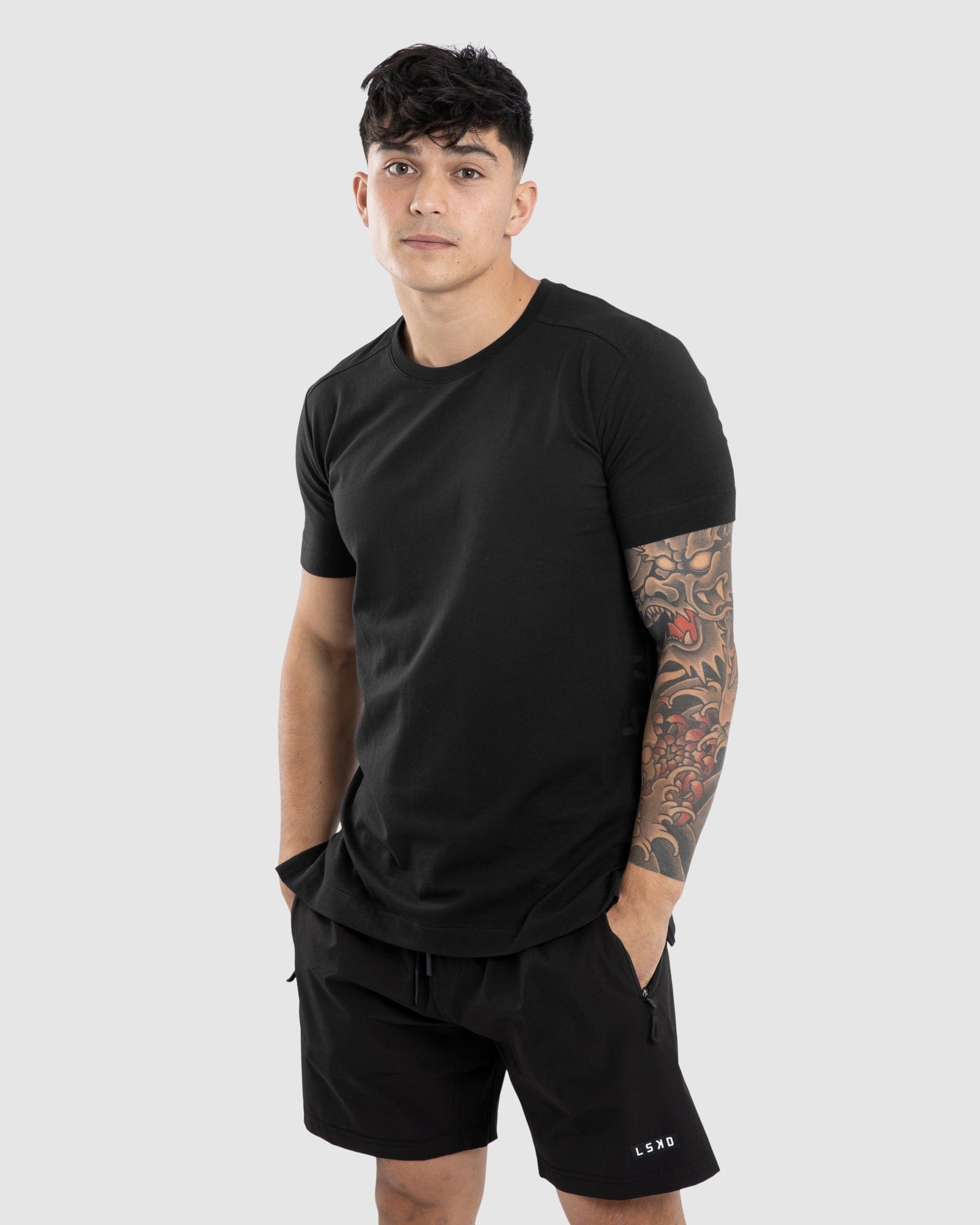 Model wearing Flex Tee - Black-Black