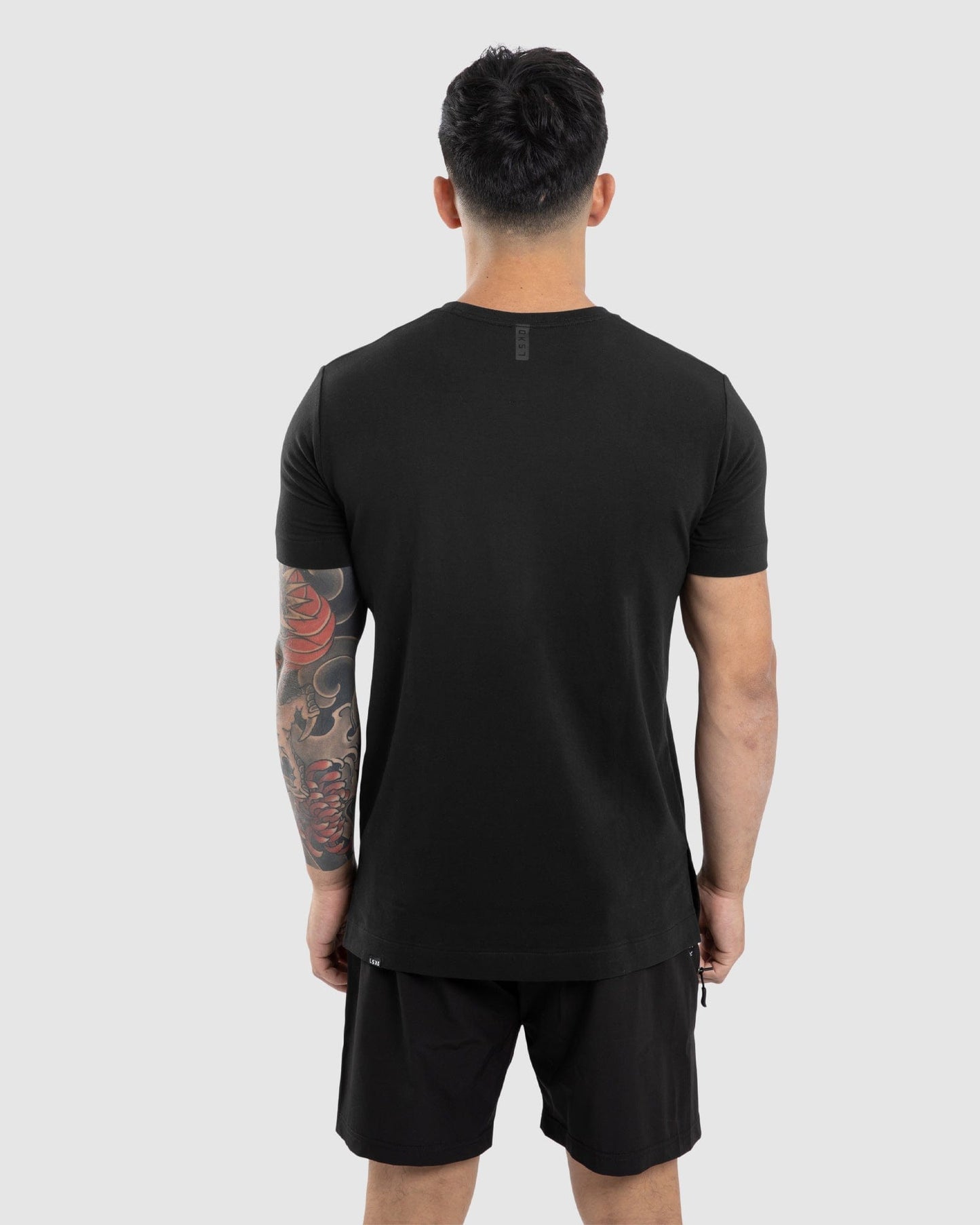 Model wearing Flex Tee - Black-Black