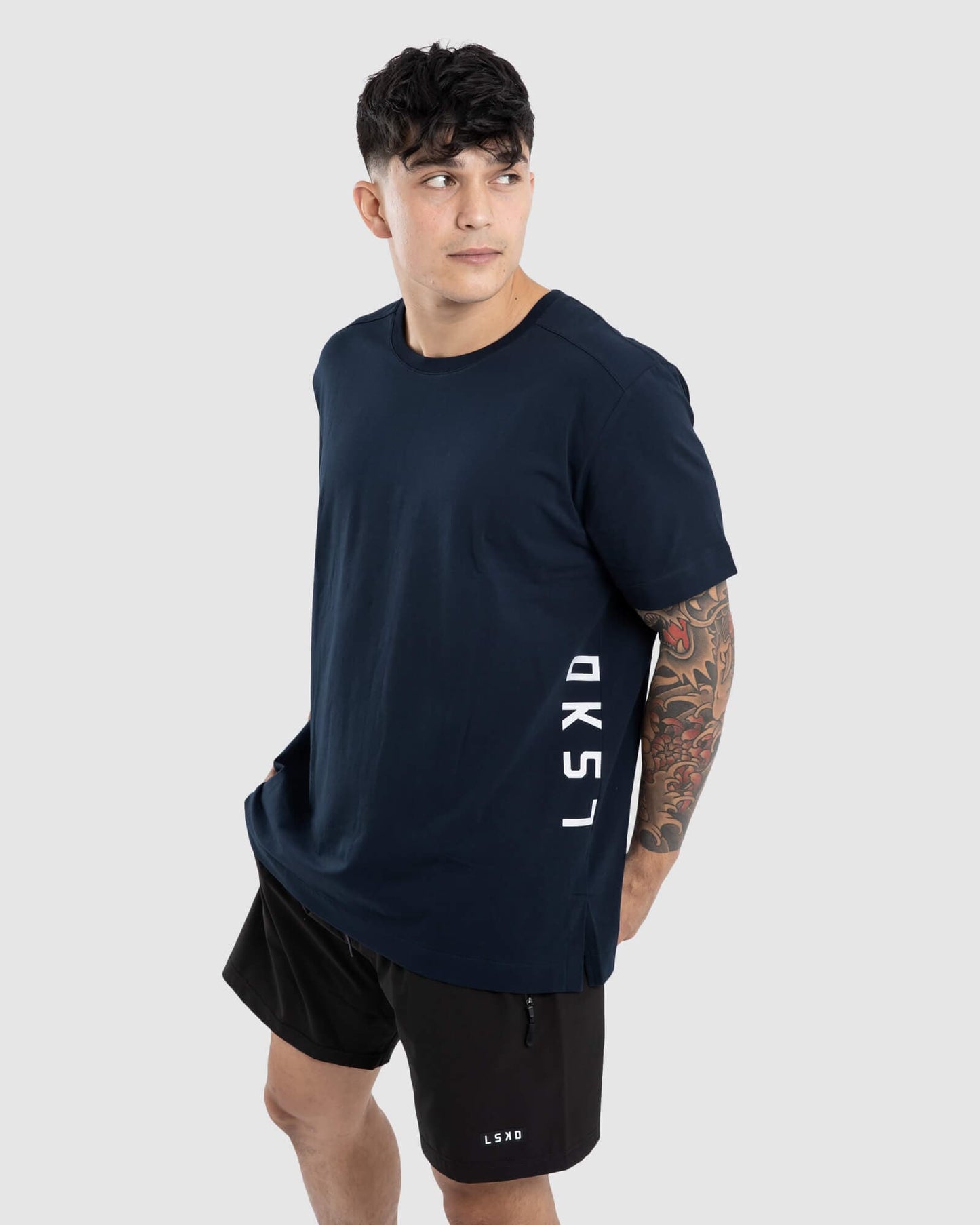 Model wearing Flex Tee - Carbon