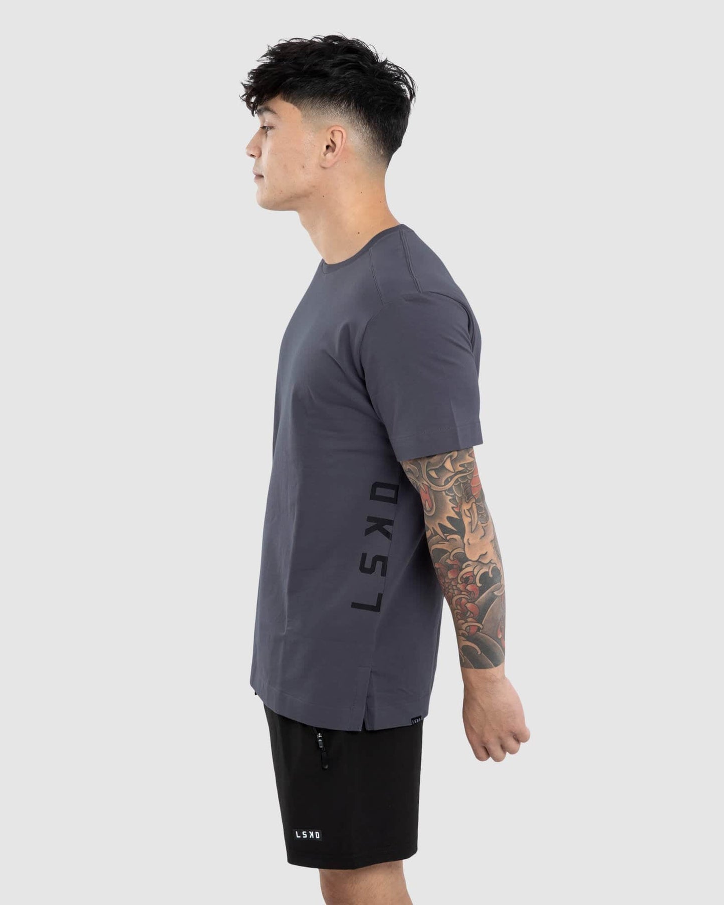 Model wearing Flex Tee - Iron