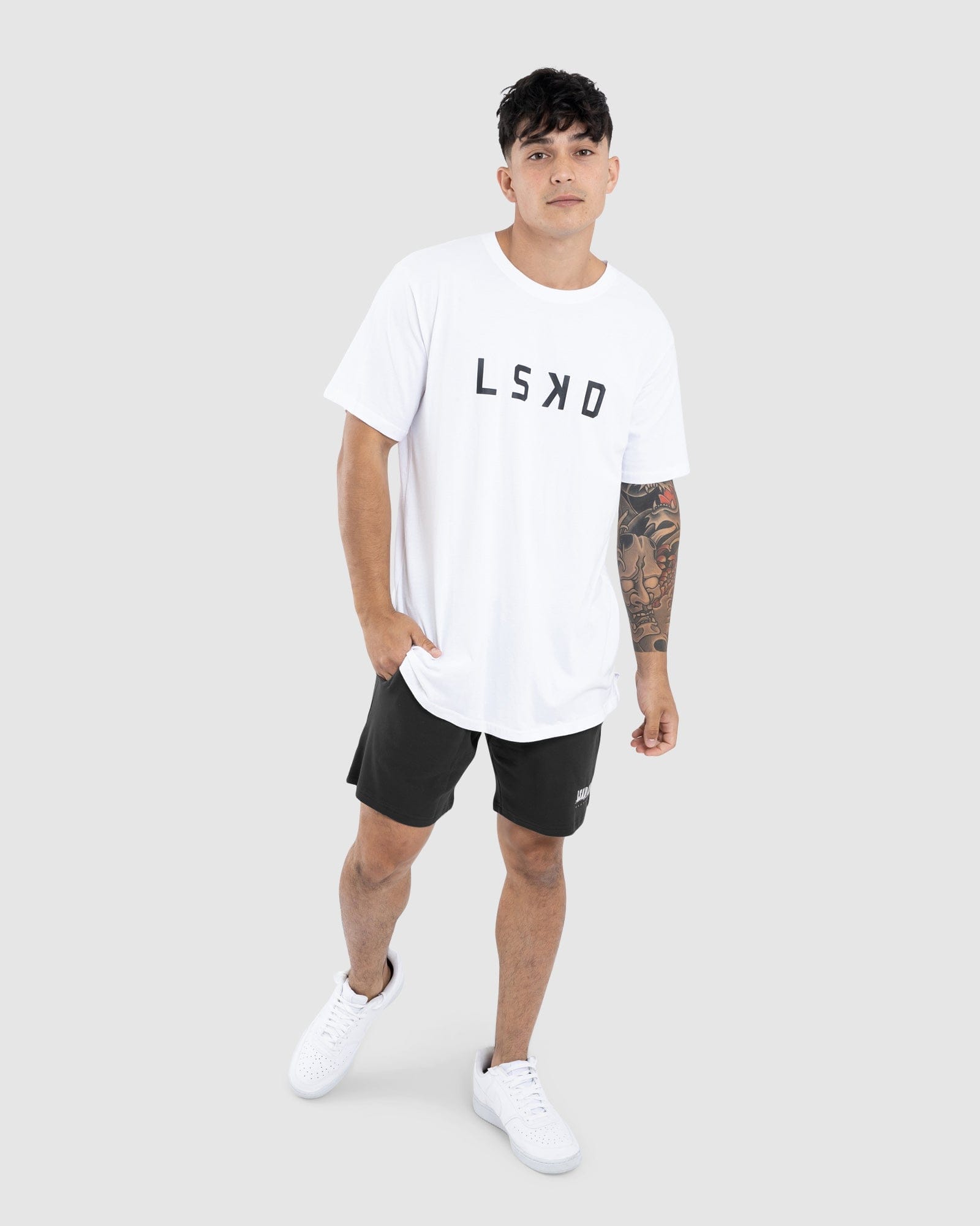 Model wearing Faculty Jersey Short - Vintage Black