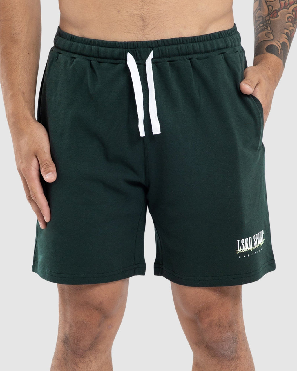Model wearing Faculty Jersey Short - Vital Green