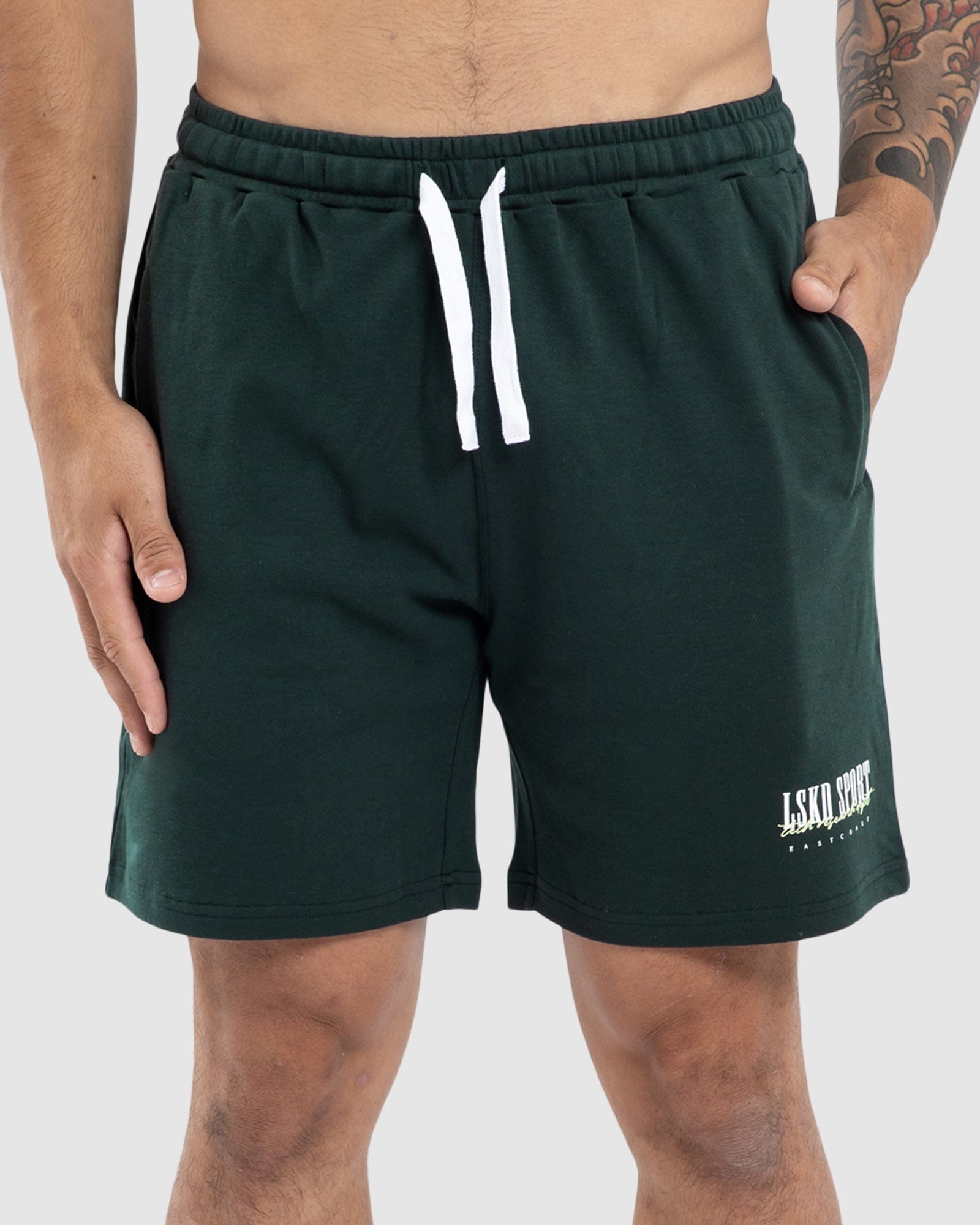 Model wearing Faculty Jersey Short - Vital Green