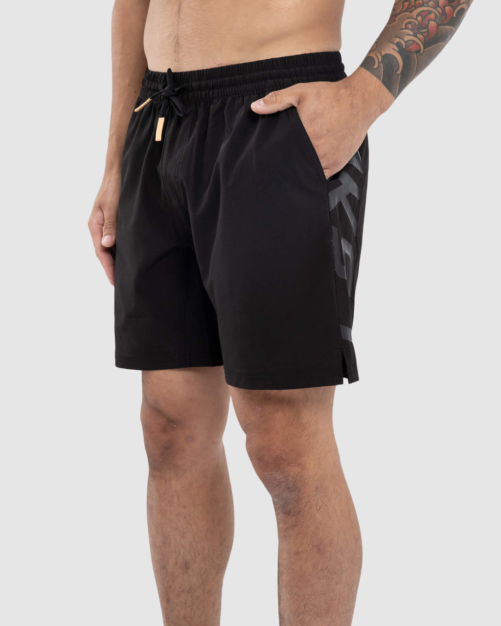 Model wearing Faction 7" Performance Short - Black-Black