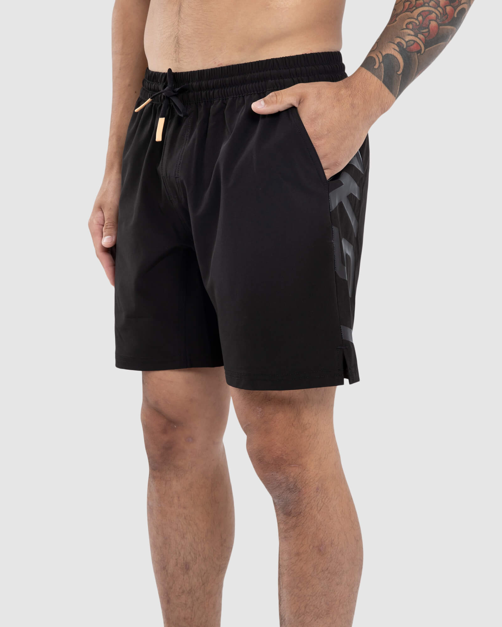 Model wearing Faction 7" Performance Short - Black-Black
