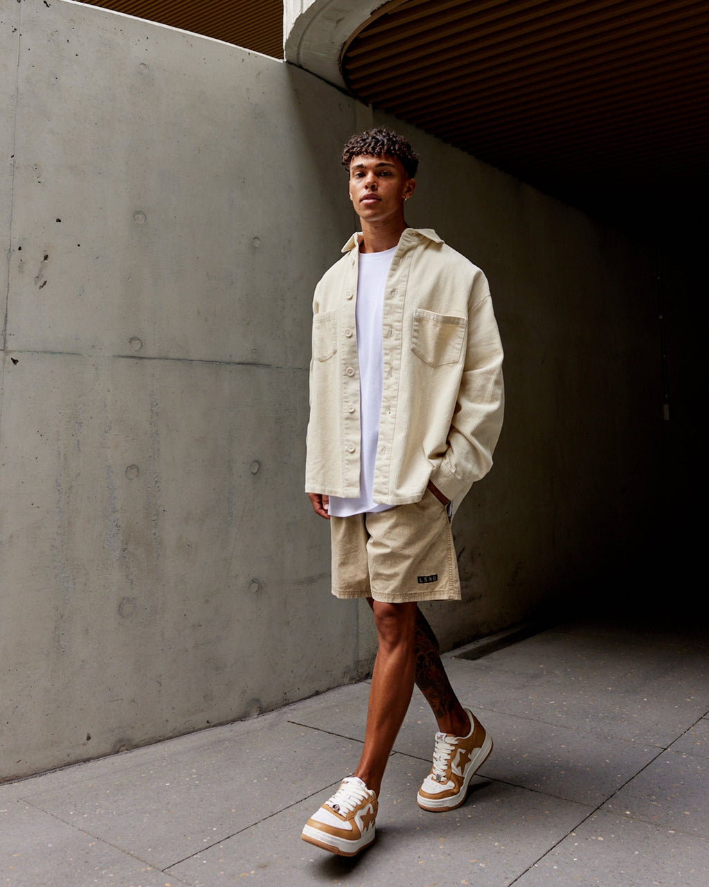 Model wearing Iconic Cord Shacket - Bone