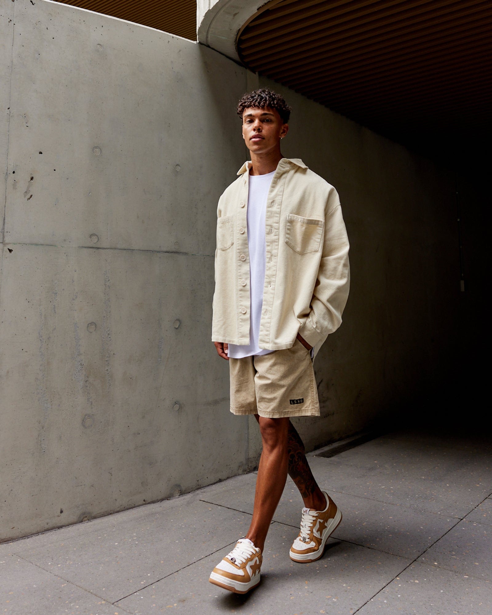 Model wearing Iconic Cord Shacket - Bone