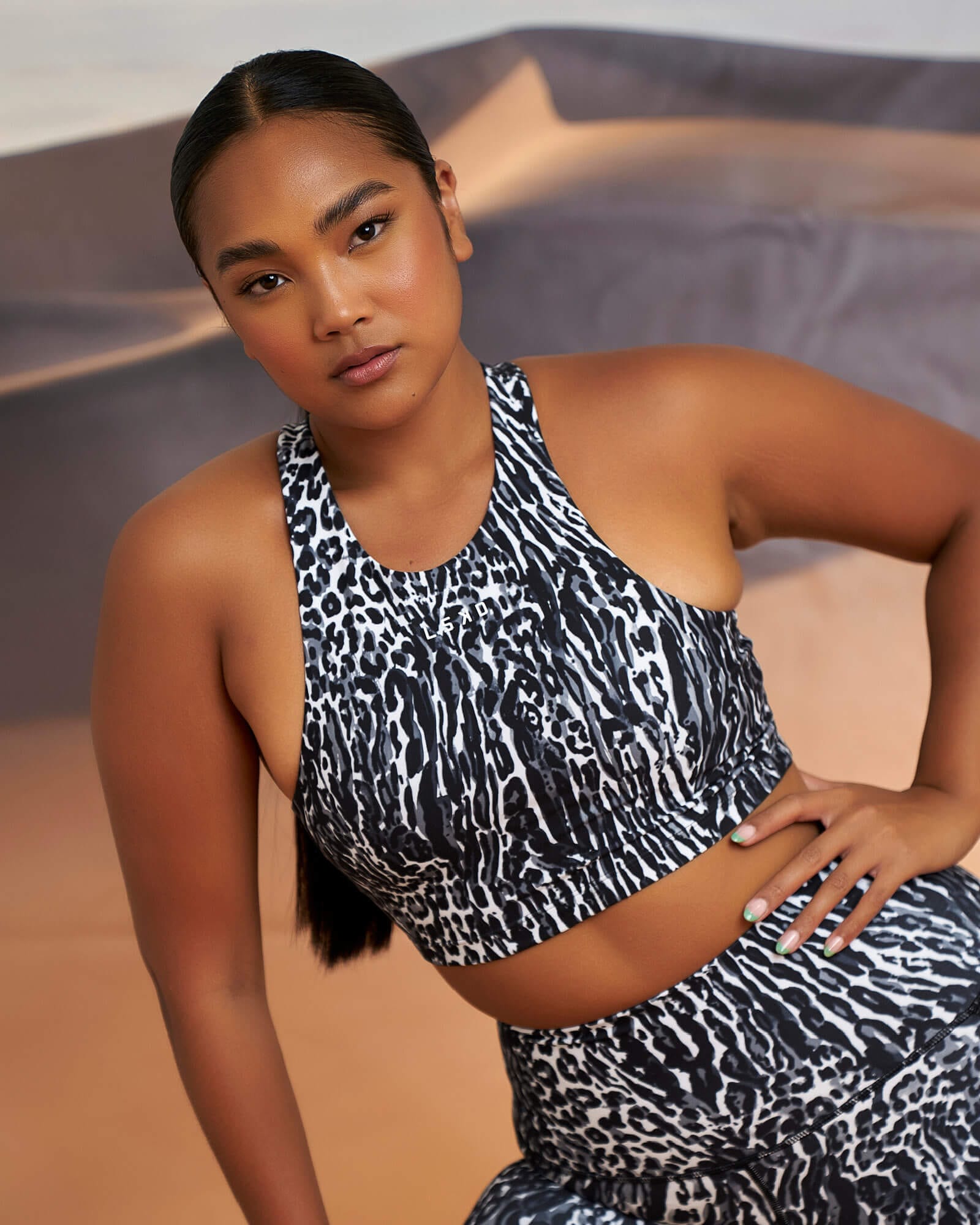 Model wearing Reformer Sport Tank - Night Leopard