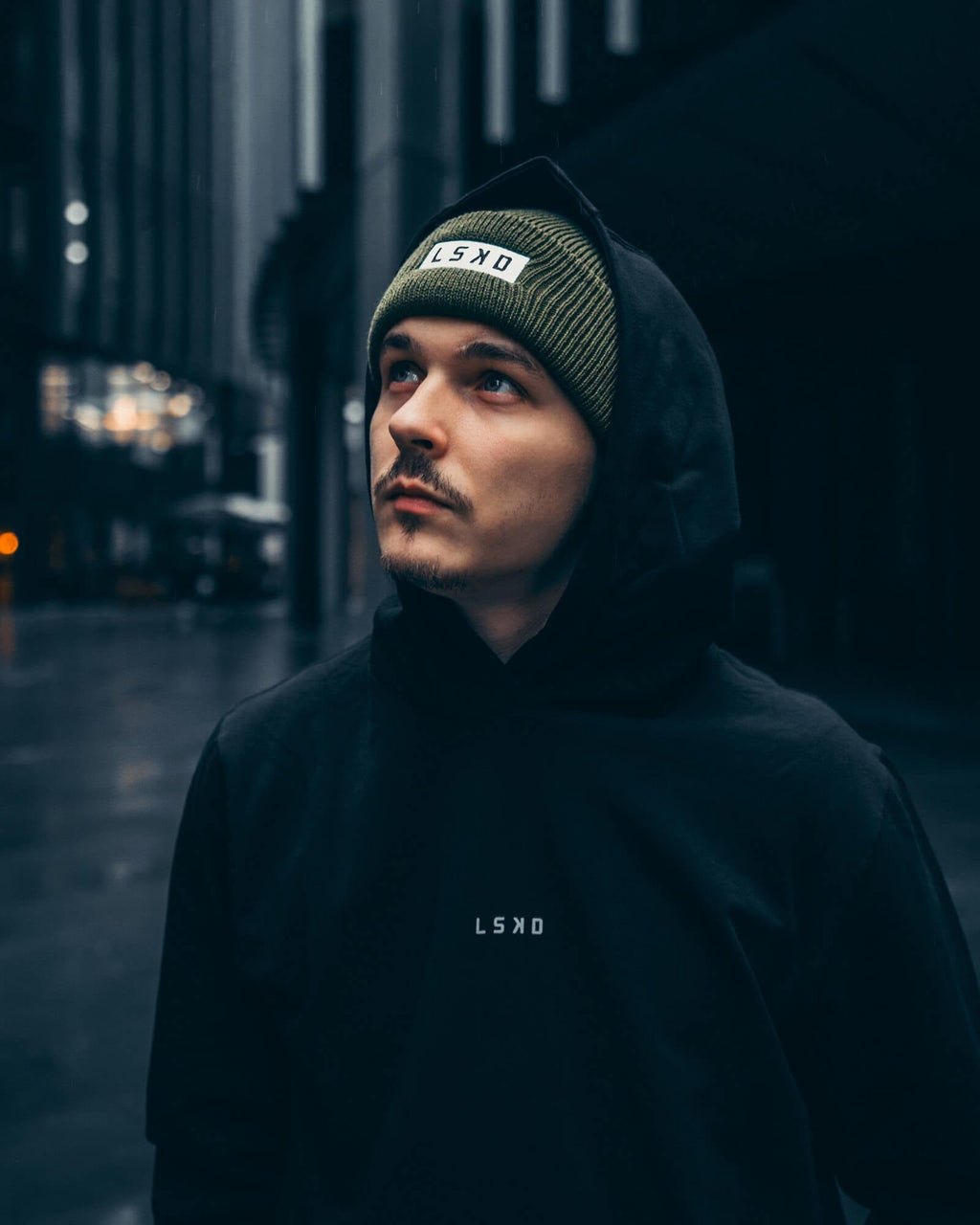 Model wearing Cornerstone Beanie - Army Green