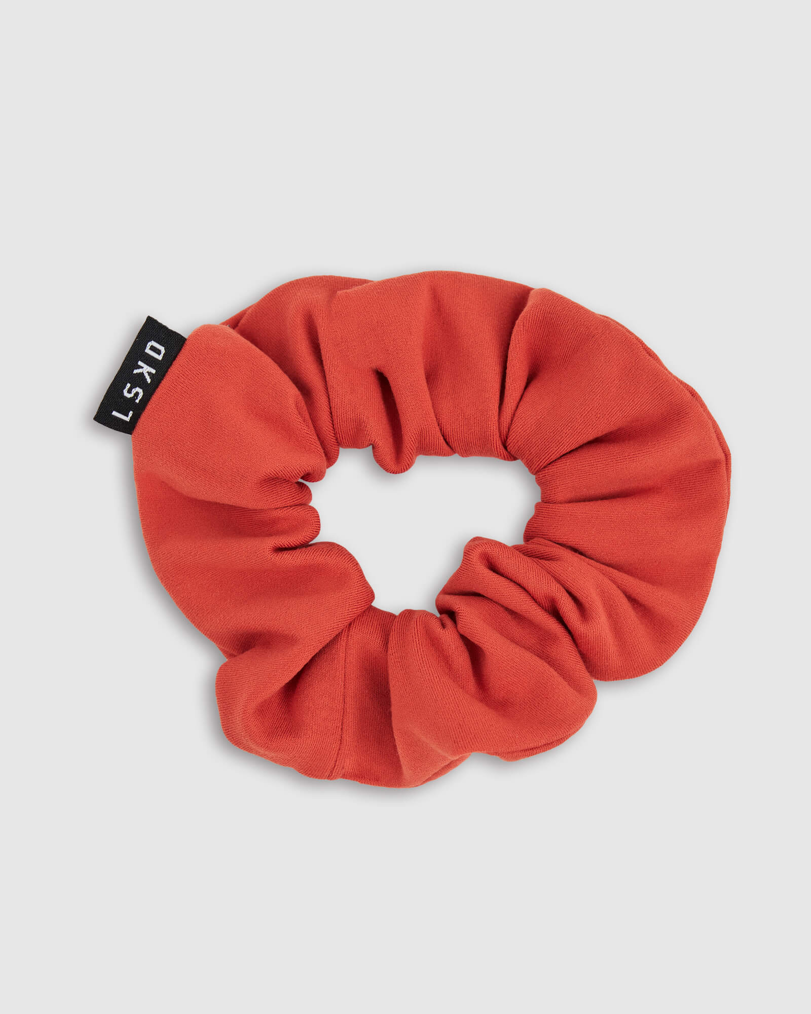 Model wearing Rep Scrunchie - Hot Tamale