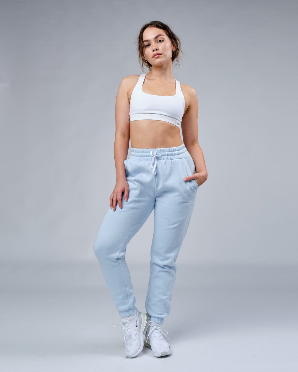 Model wearing Unisex Ready Track Pant - Sky Blue