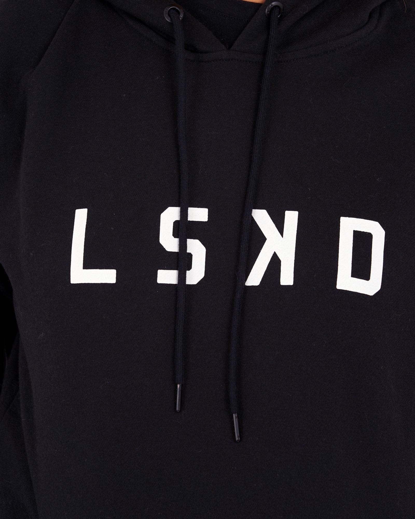 Model wearing Unisex Structure Hoodie - Black