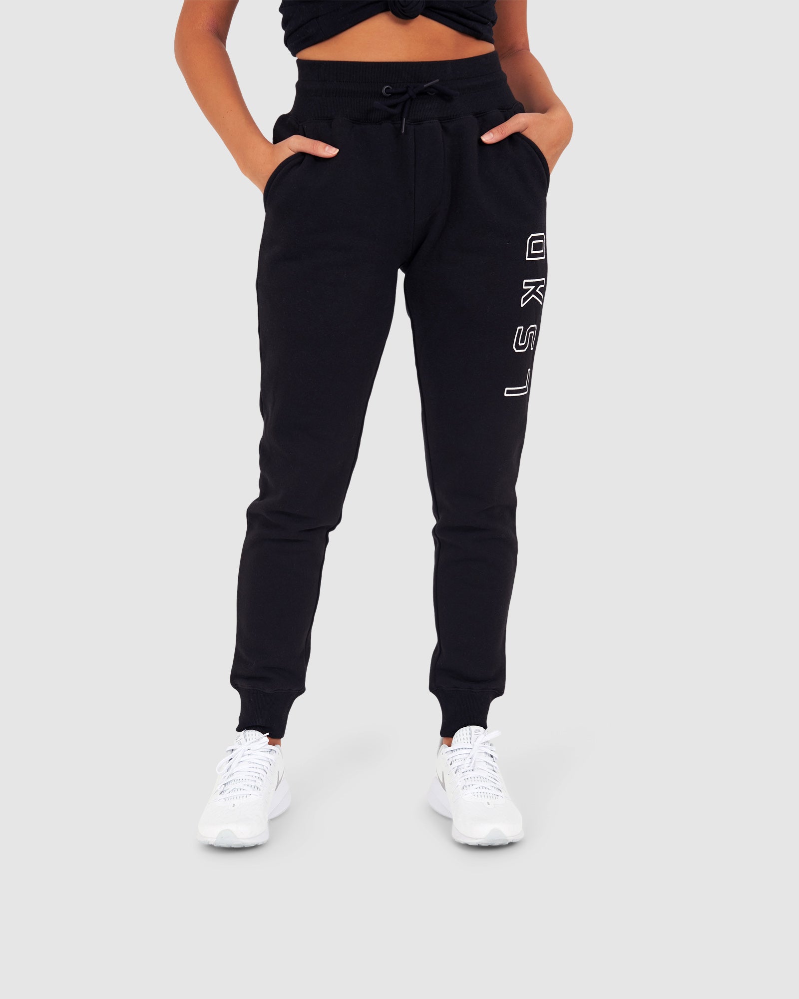 Model wearing Unisex Tidy Trackpant - Black