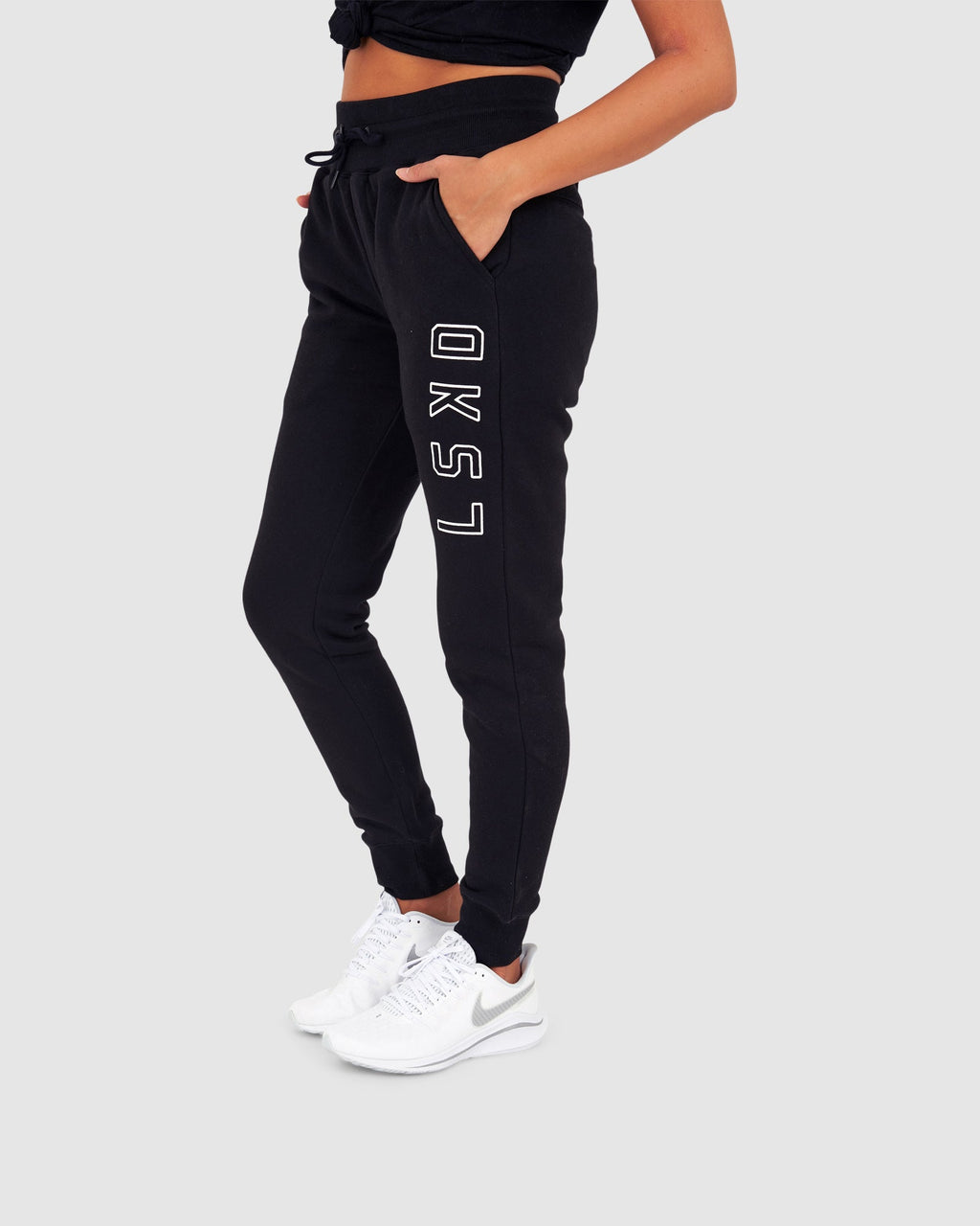 Model wearing Unisex Tidy Trackpant - Black