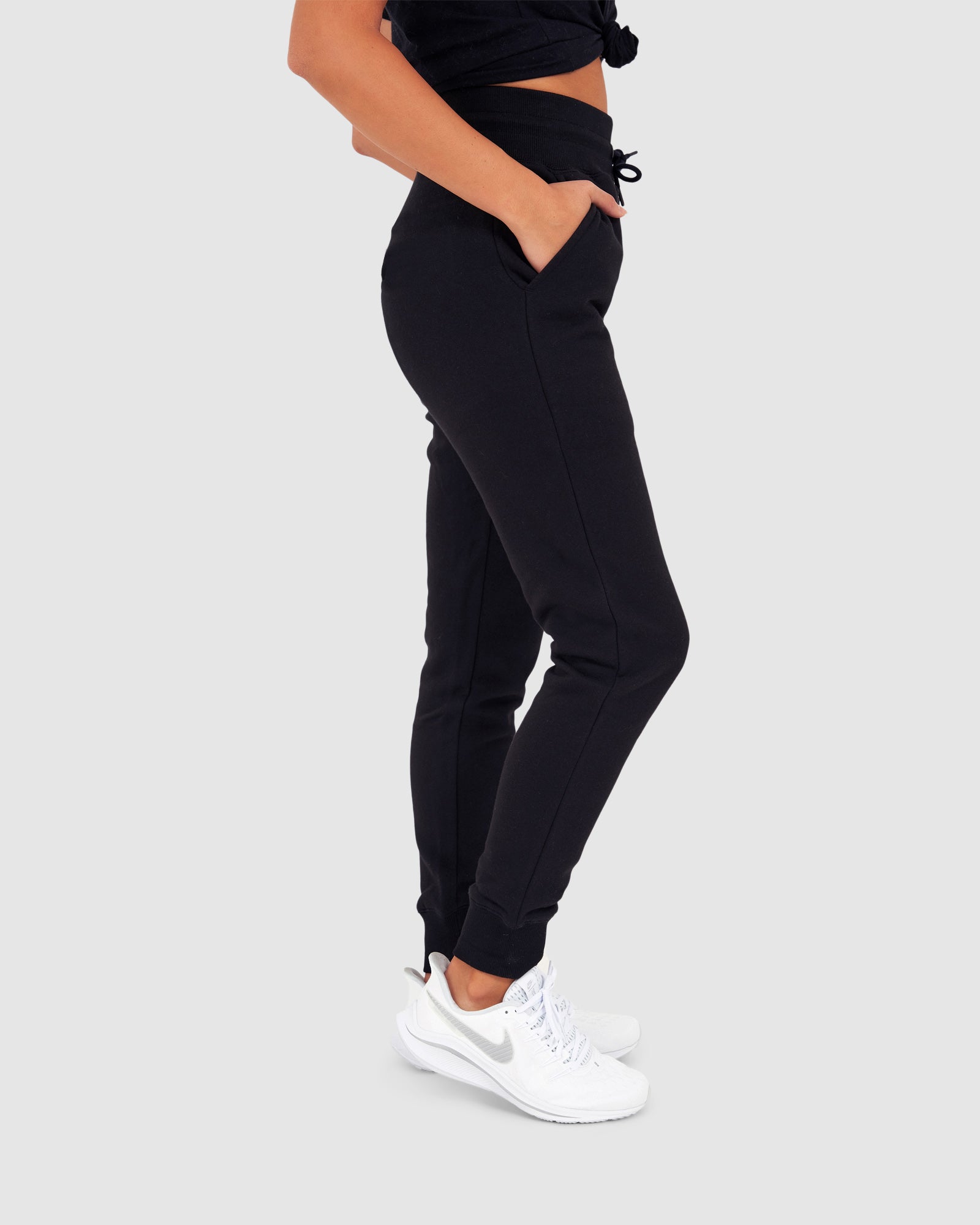 Model wearing Unisex Tidy Trackpant - Black