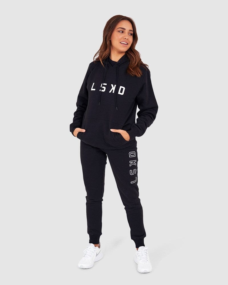Model wearing Unisex Structure Hoodie - Black
