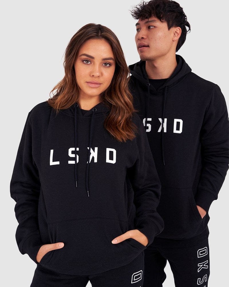 Model wearing Unisex Structure Hoodie - Black