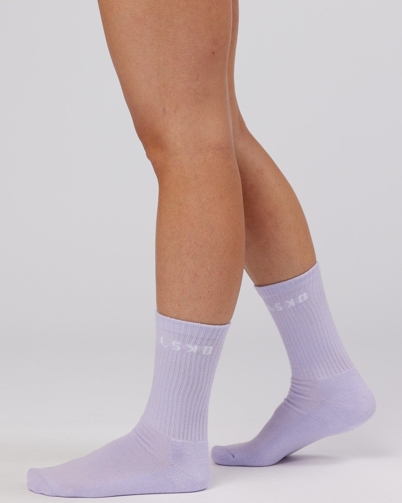 Model wearing Daily 3 Pack Crew Sock - Pink/Purple/Green
