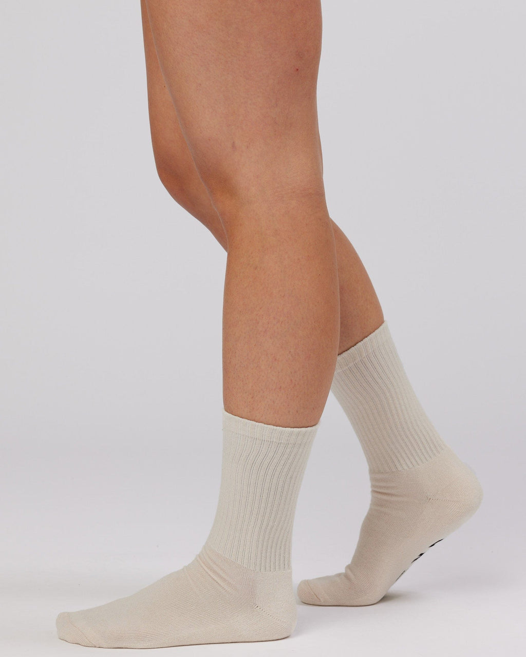 Model wearing Essential 3 Pack Crew Sock - Khaki/Cream/Red