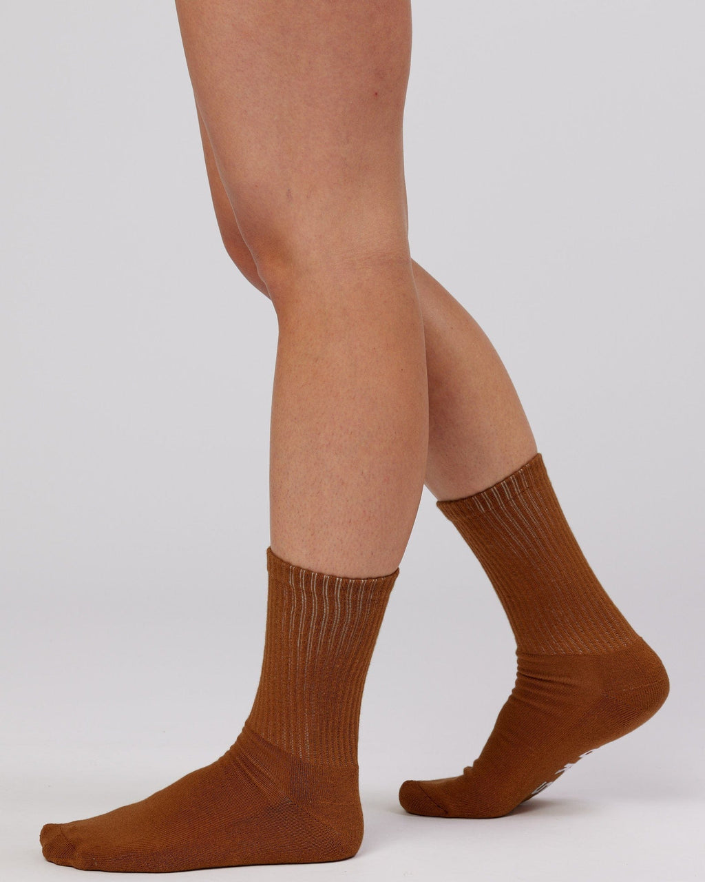 Model wearing Essential 3 Pack Crew Sock - Khaki/Cream/Red