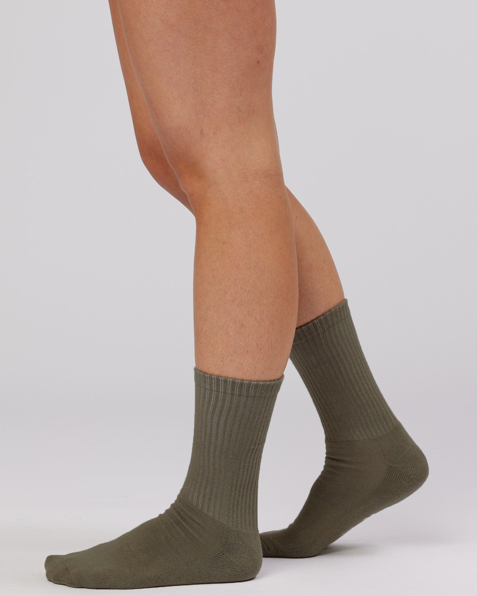 Model wearing Essential 3 Pack Crew Sock - Khaki/Cream/Red