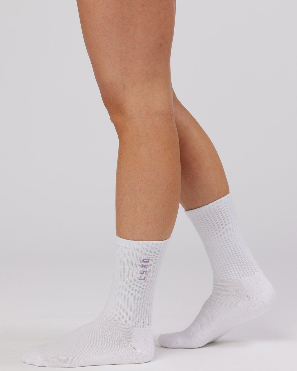 Model wearing Signal 3 Pack Crew Sock - Pink/Purple/Teal