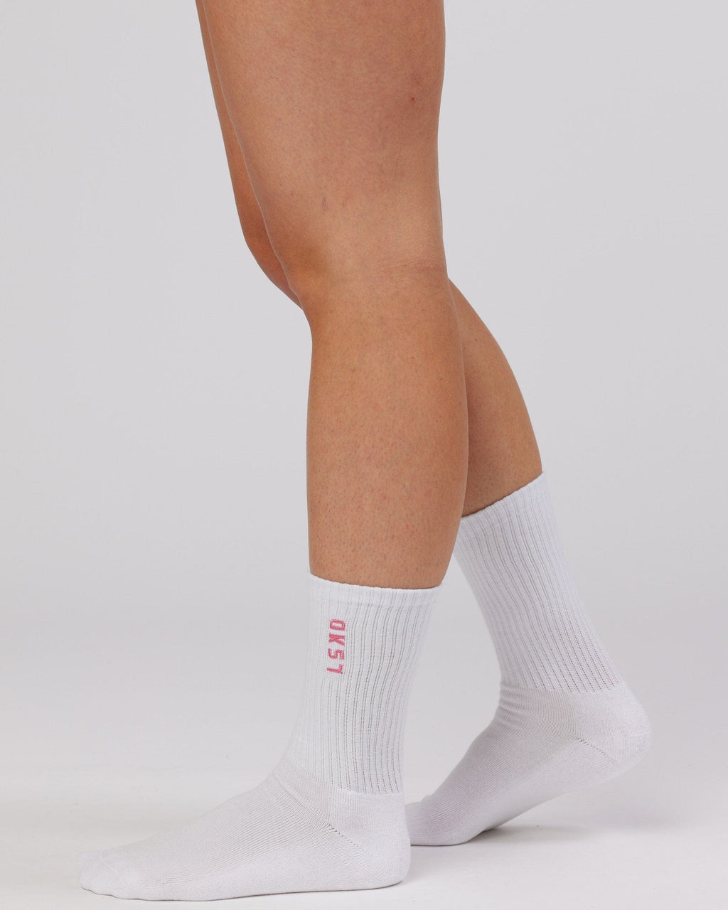 Model wearing Signal 3 Pack Crew Sock - Pink/Purple/Teal