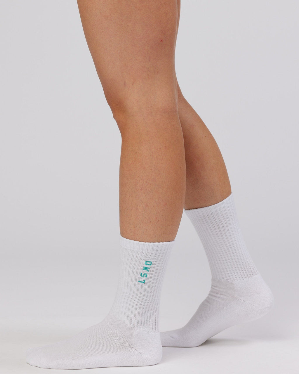 Model wearing Signal 3 Pack Crew Sock - Pink/Purple/Teal