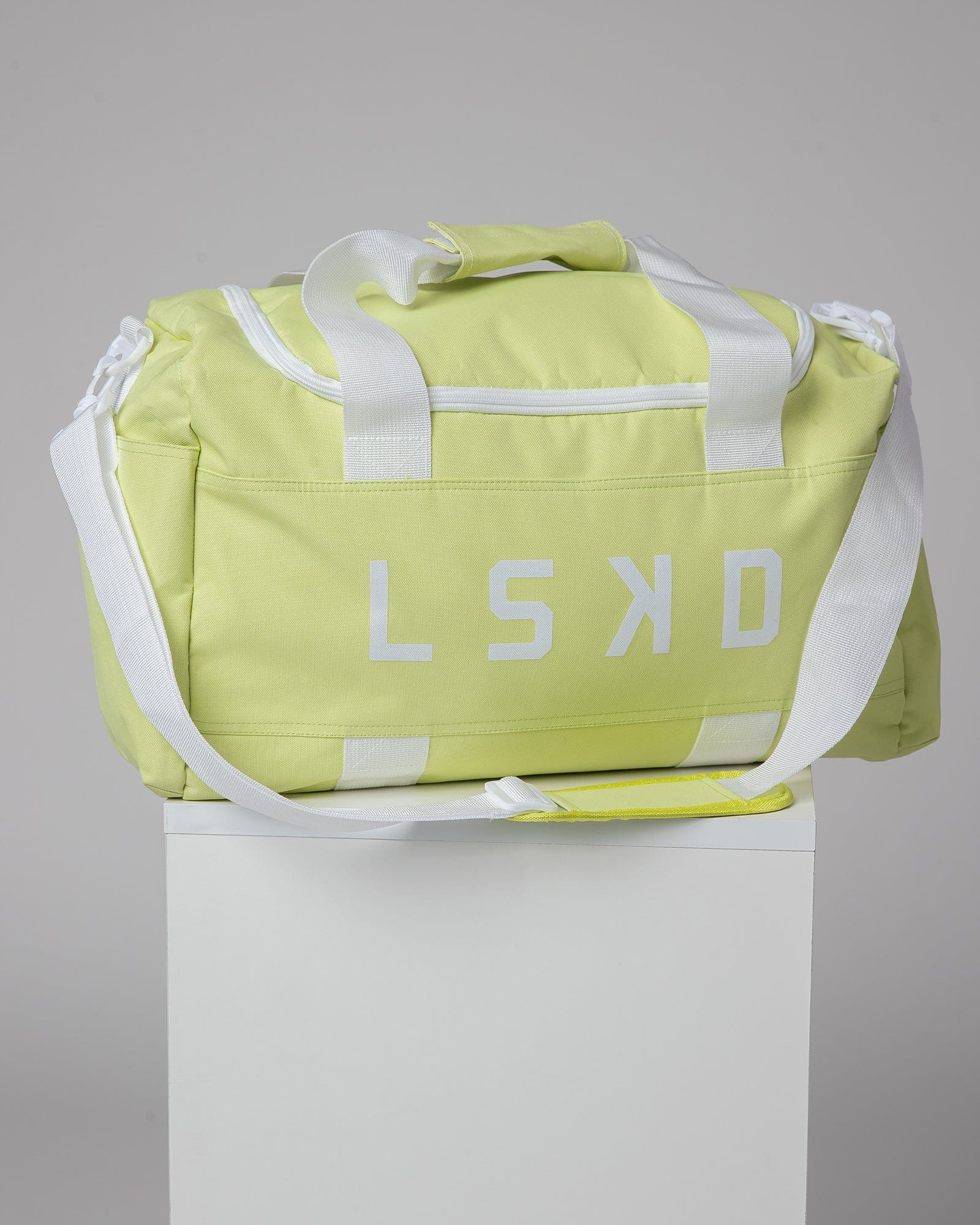Model wearing Essential Duffle Bag - Pastel Lime
