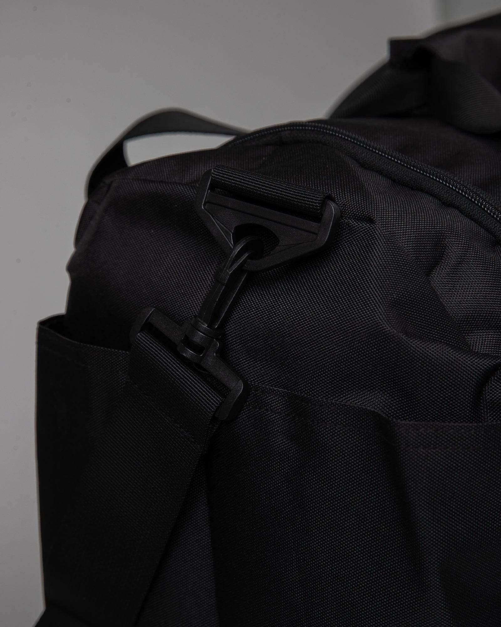 Model wearing Essential Duffle Bag Gift - Black