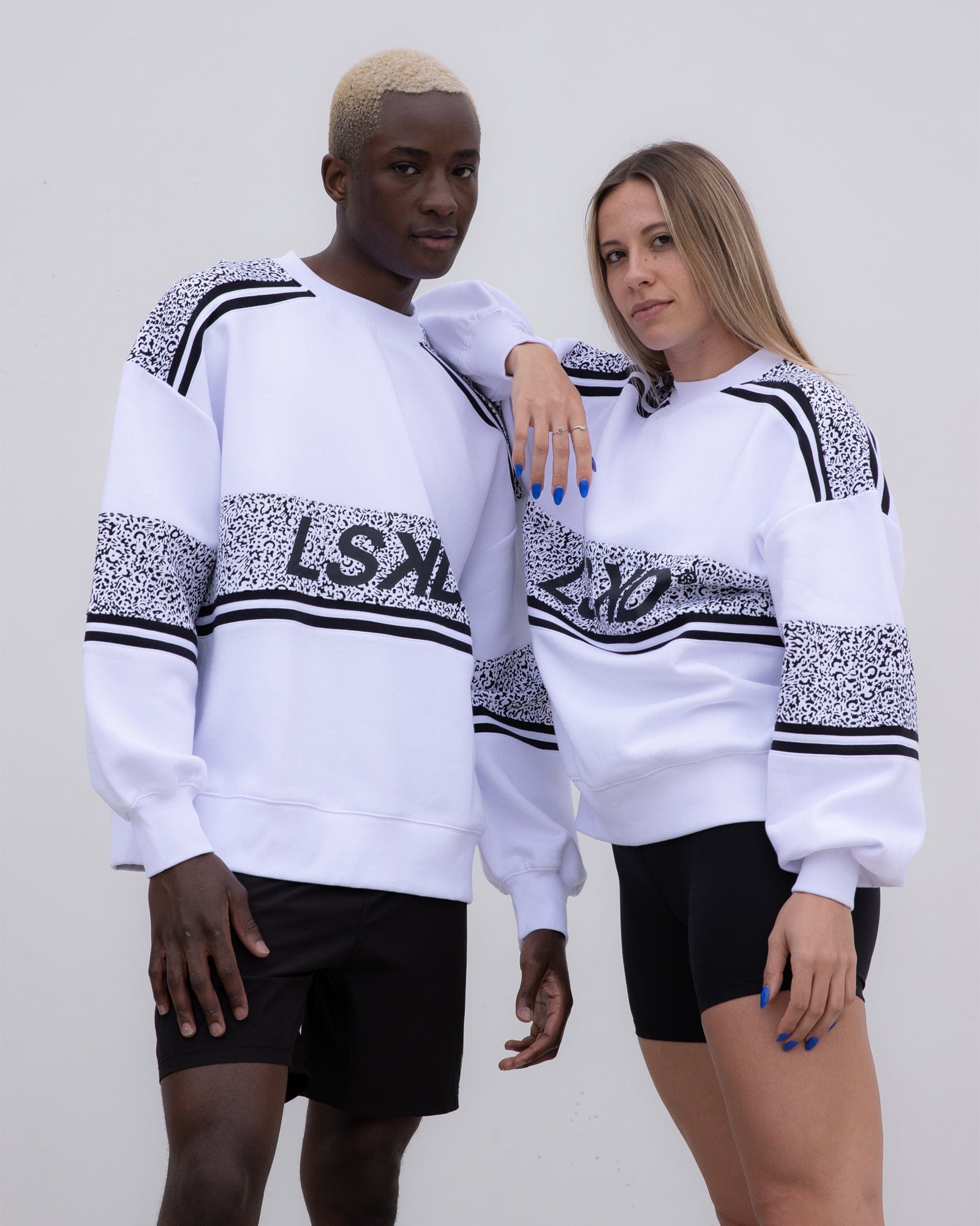 Model wearing Unisex A-Team Oversize Sweater - Spotty White-Black