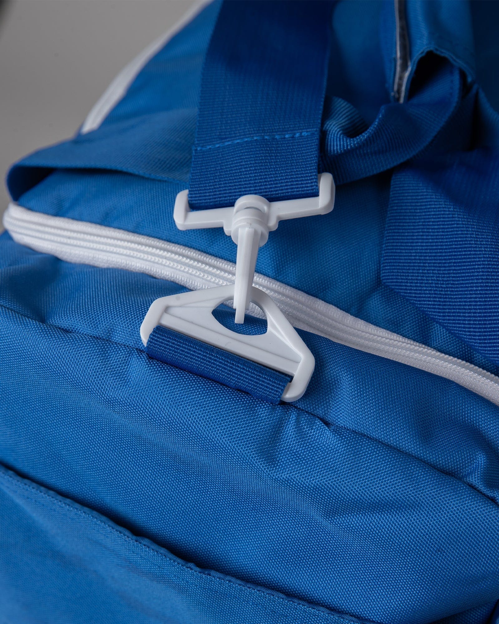 Model wearing Essential Duffle Bag - Turkish Sea