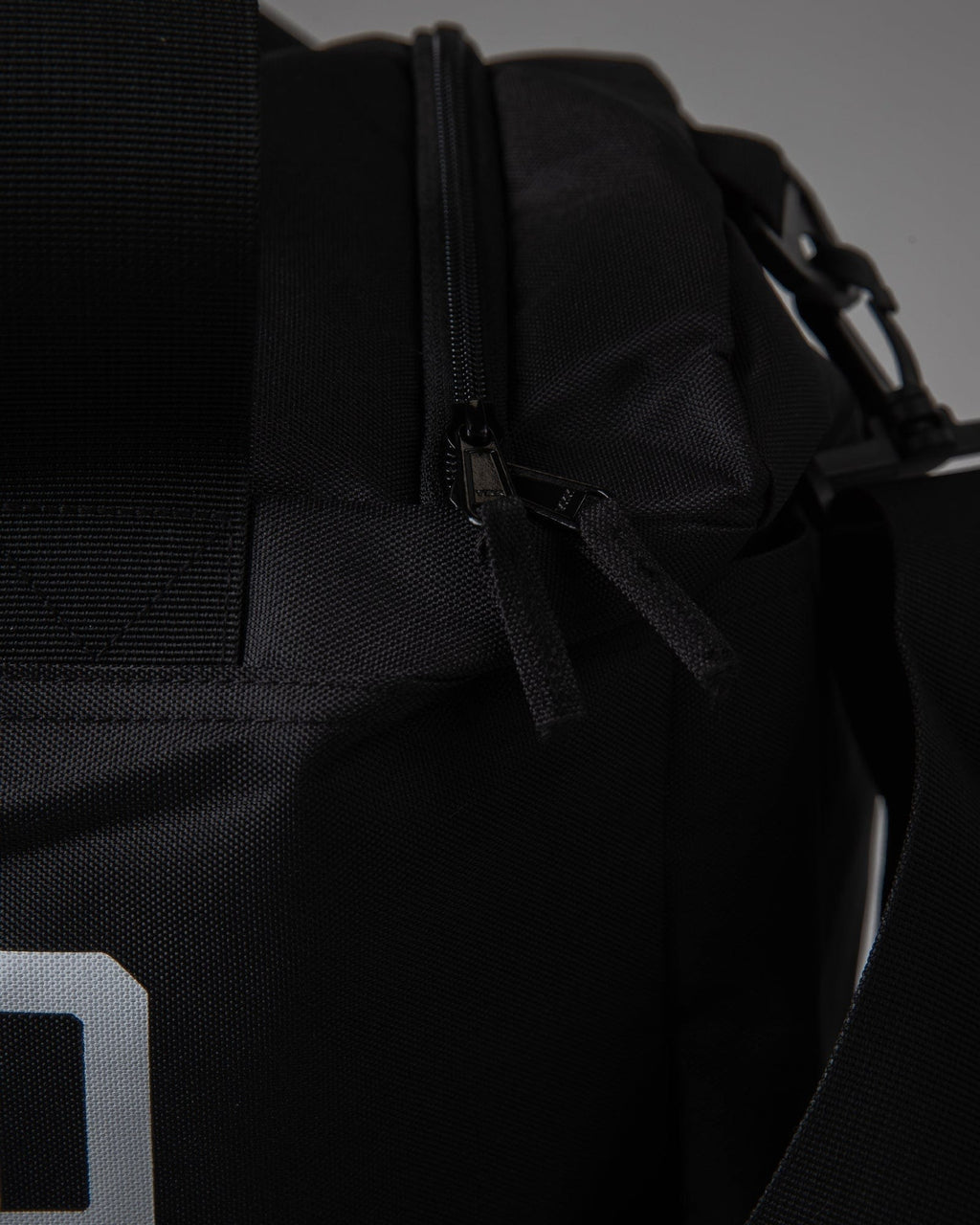 Model wearing Essential Duffle Bag Gift - Black