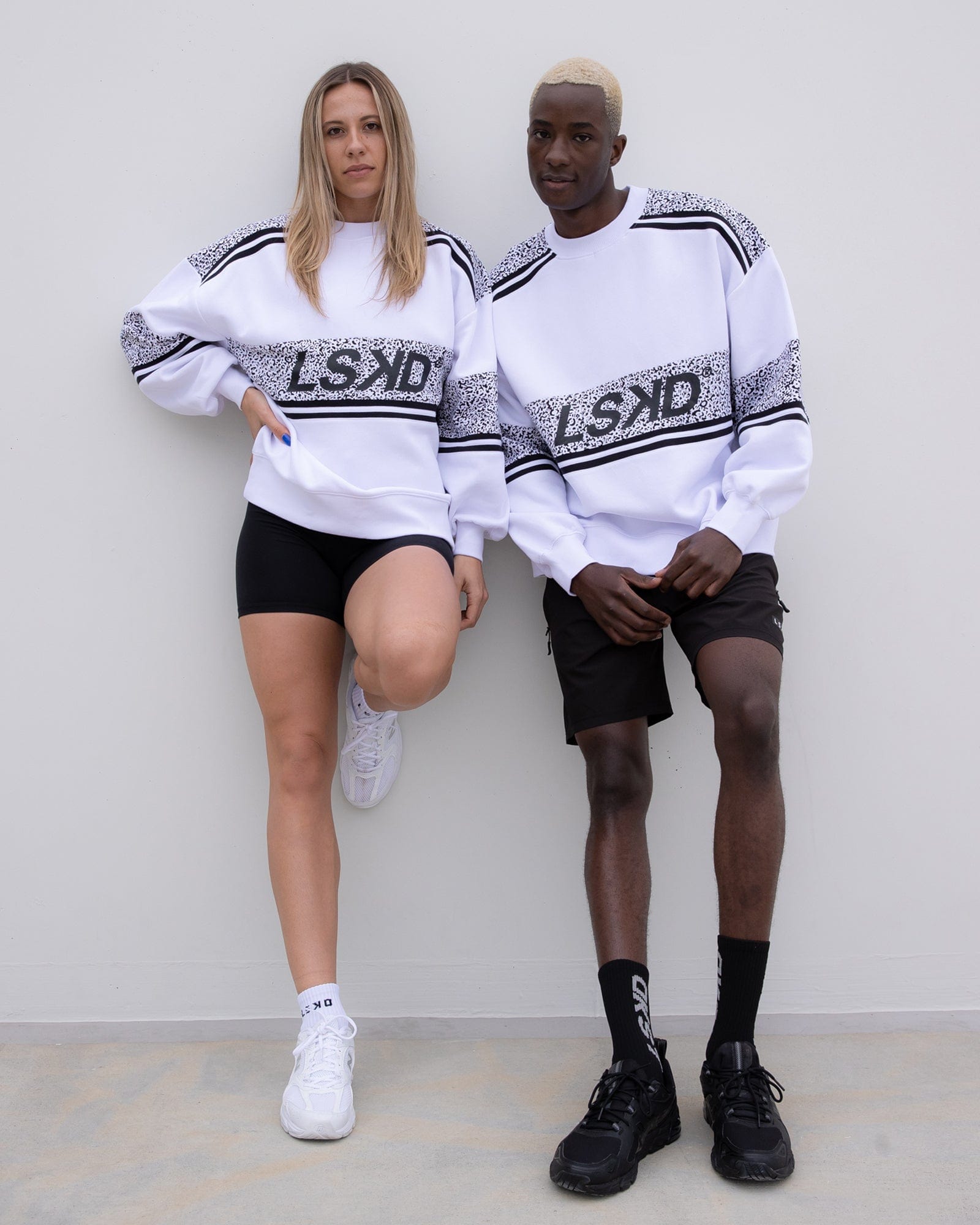 Model wearing Unisex A-Team Oversize Sweater - Spotty White-Black