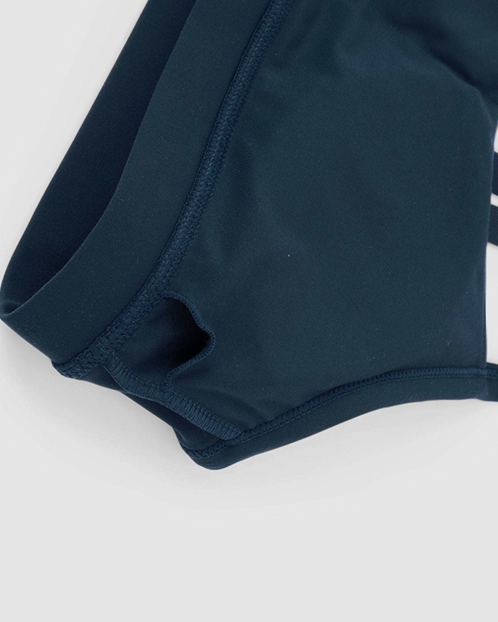 Model wearing Momentum Sports Bra - Deep Teal