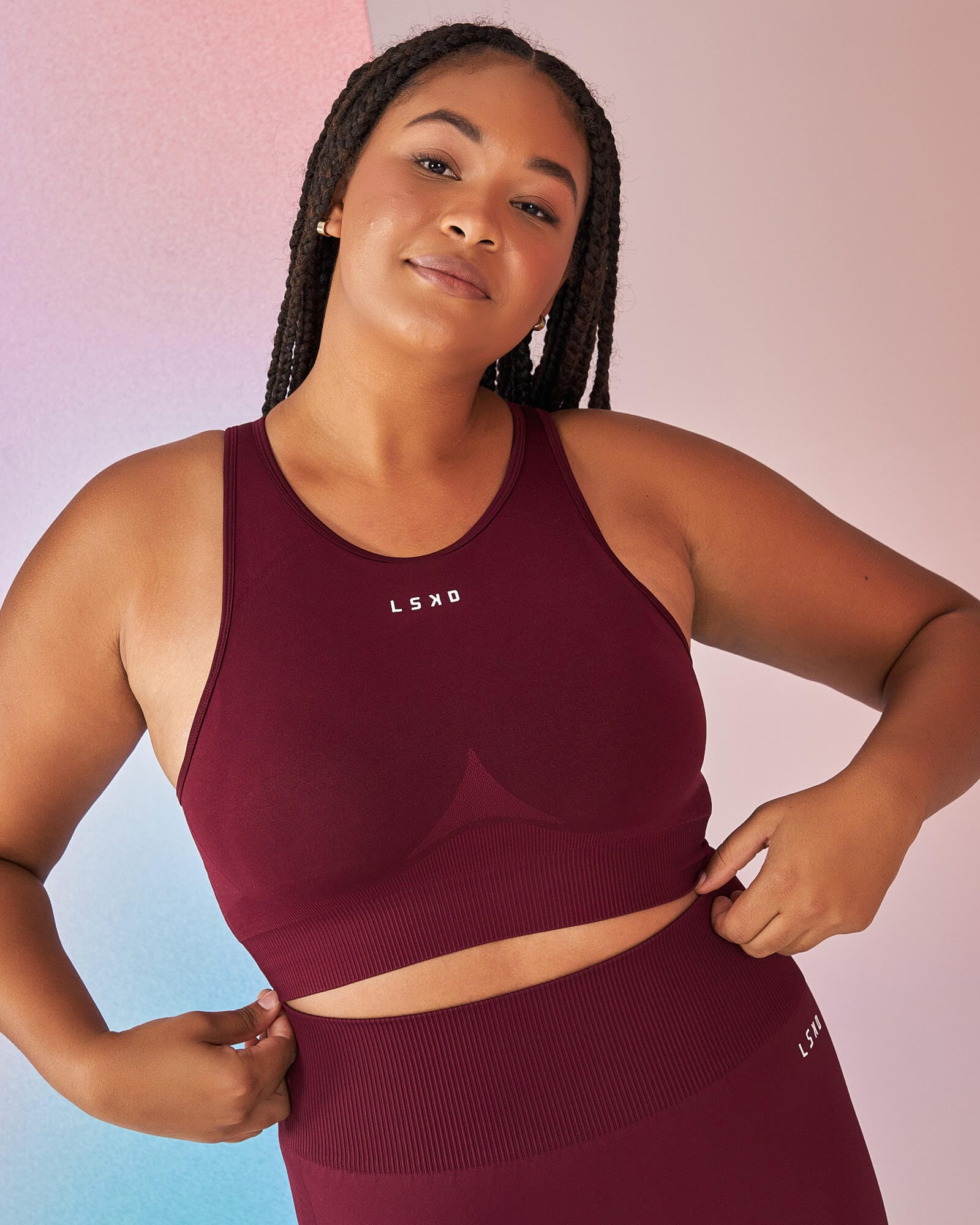 Model wearing Limitless Seamless Crop Top - Wine
