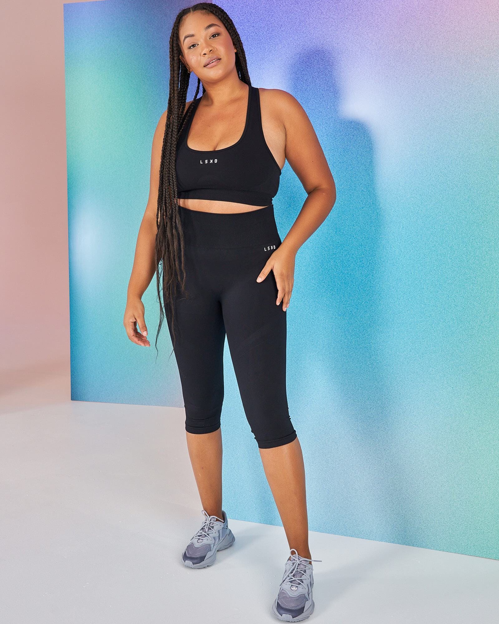 Model wearing Limitless Seamless 3/4 Length Tight - Black