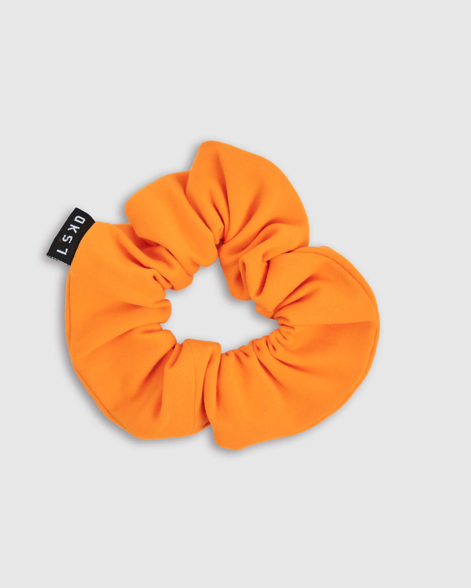 Model wearing Rep Scrunchie - Orange