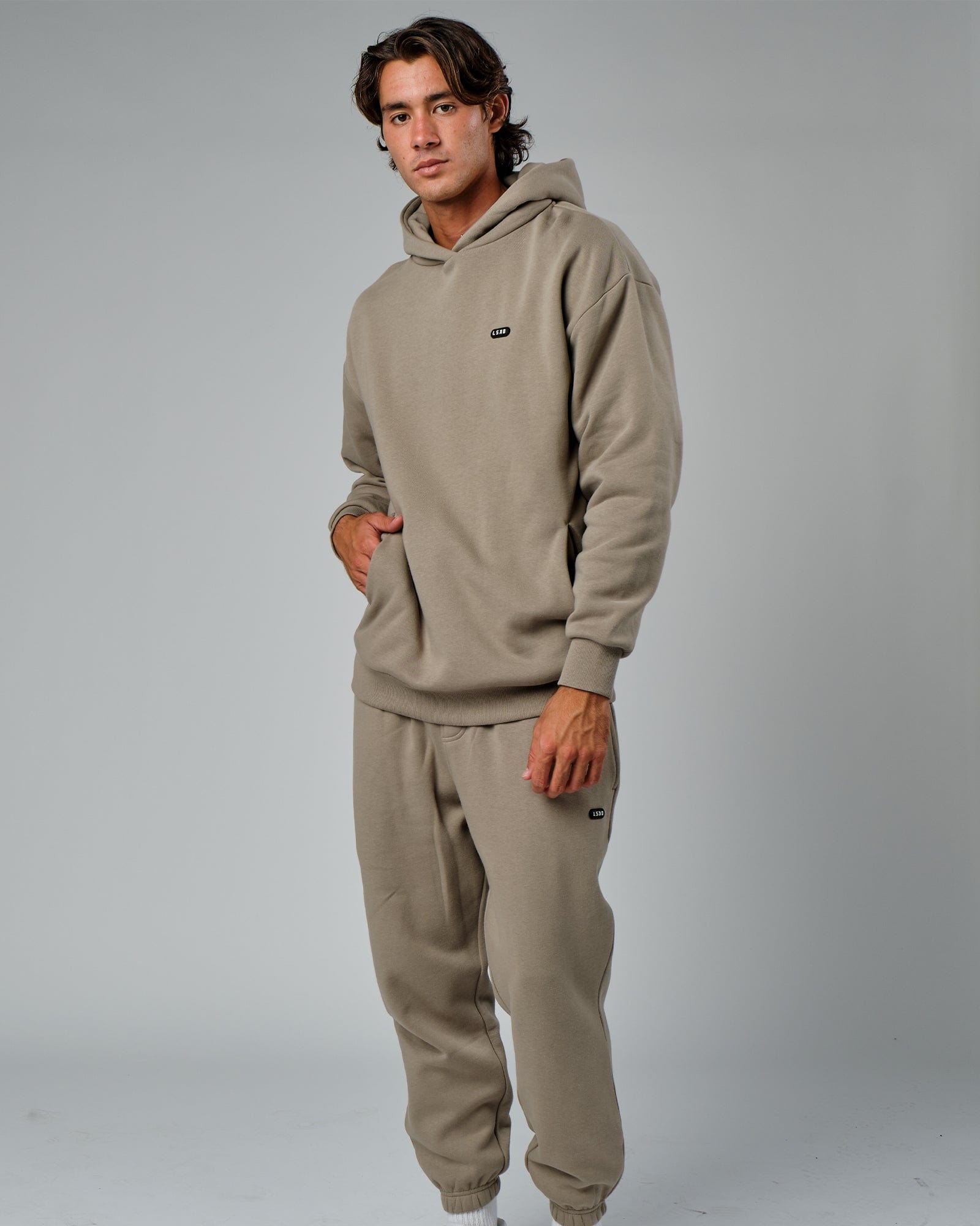 Model wearing Capsule Hoodie Oversize - Laurel Oak