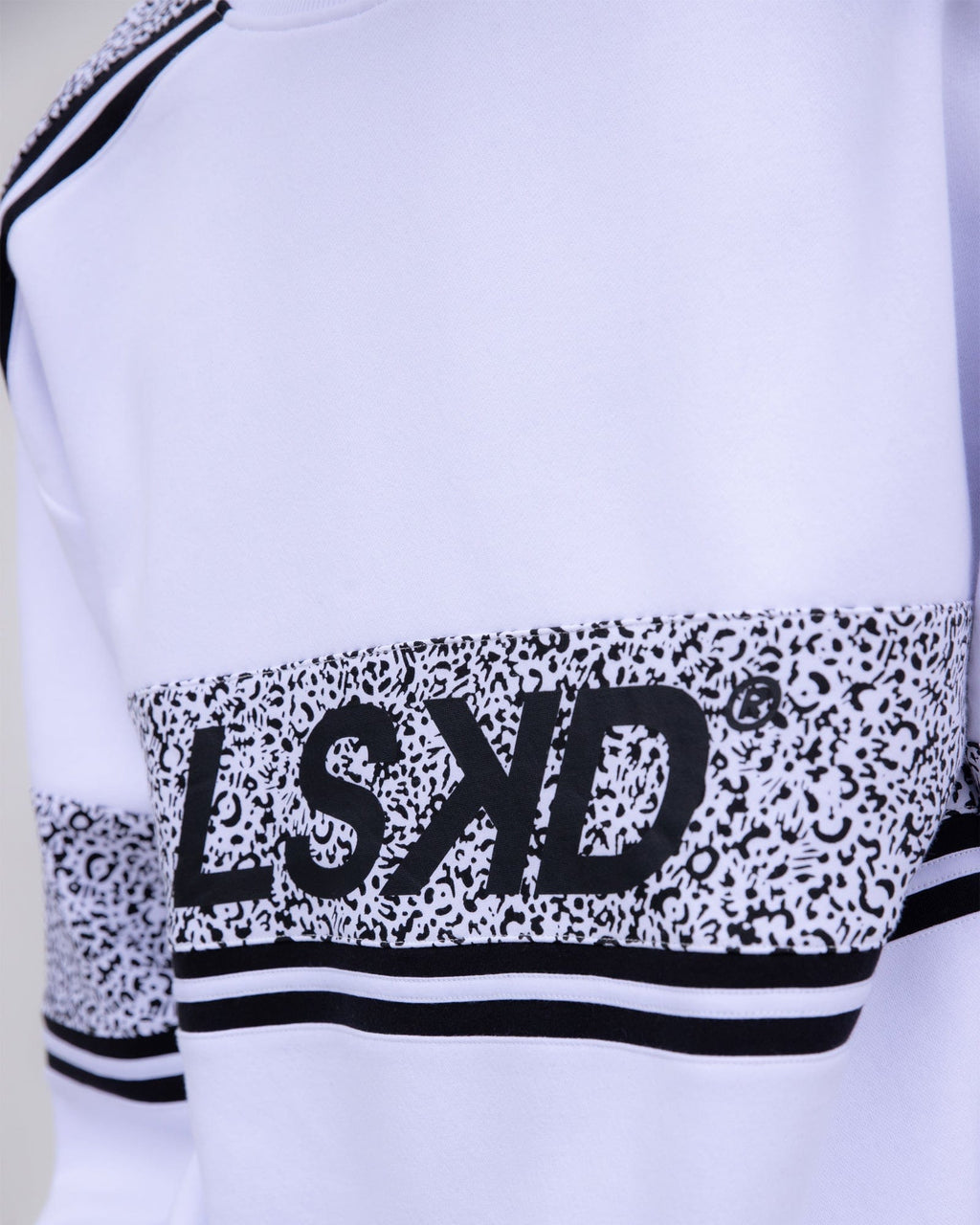 Model wearing Unisex A-Team Oversize Sweater - Spotty White-Black