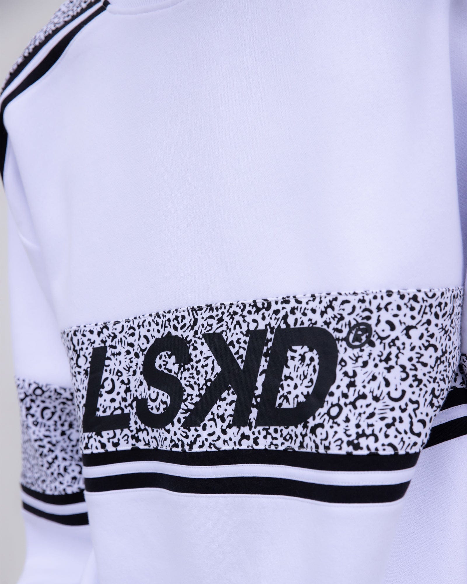 Model wearing Unisex A-Team Oversize Sweater - Spotty White-Black