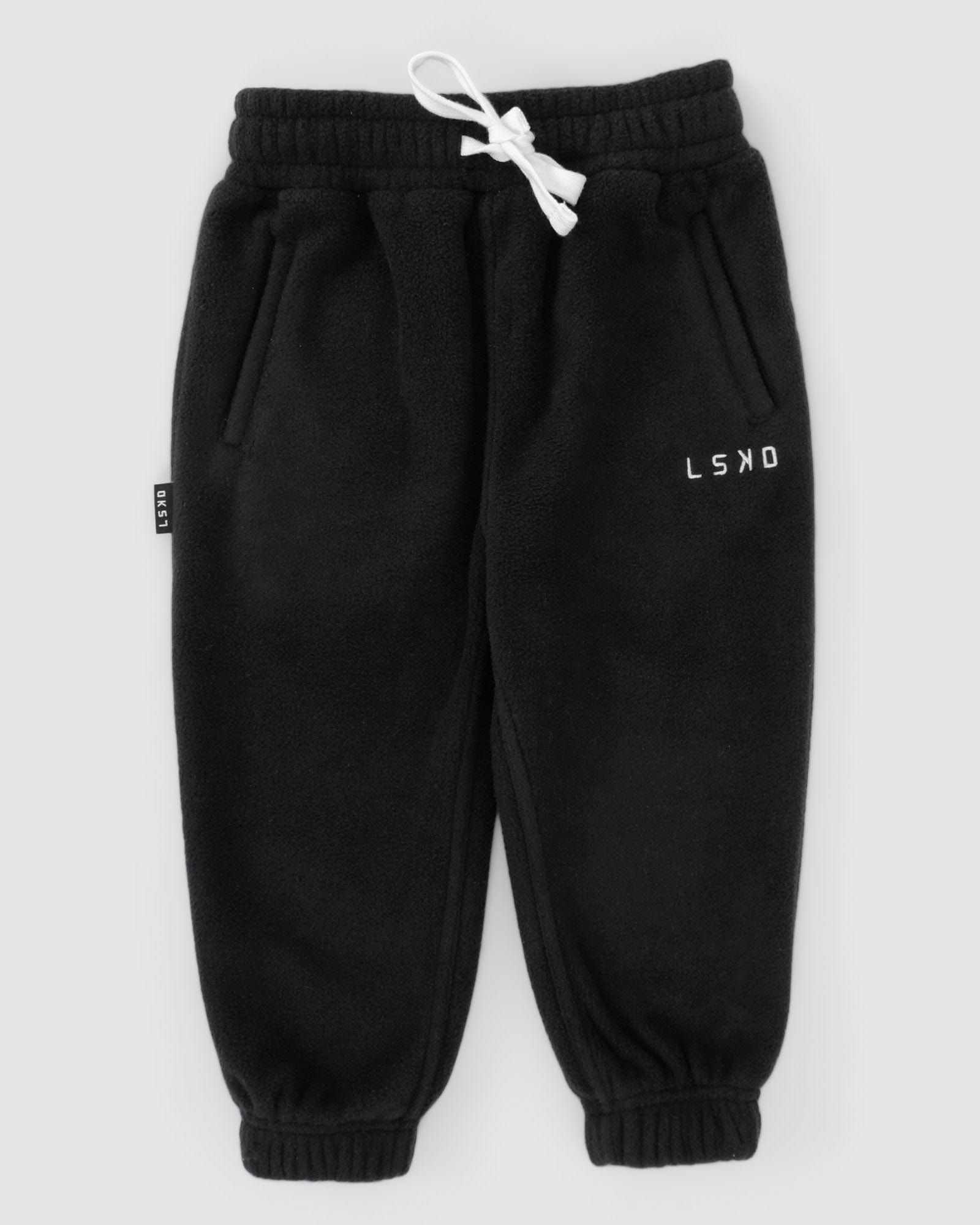 Model wearing Wanderer Trackpant (00-8) - Black