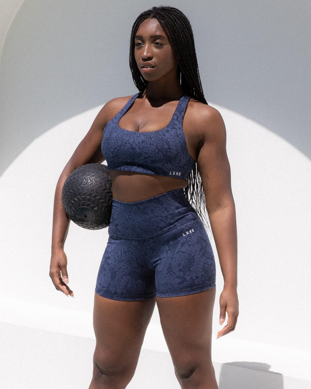 Model wearing Base X-Short Tight - Navy Mamba