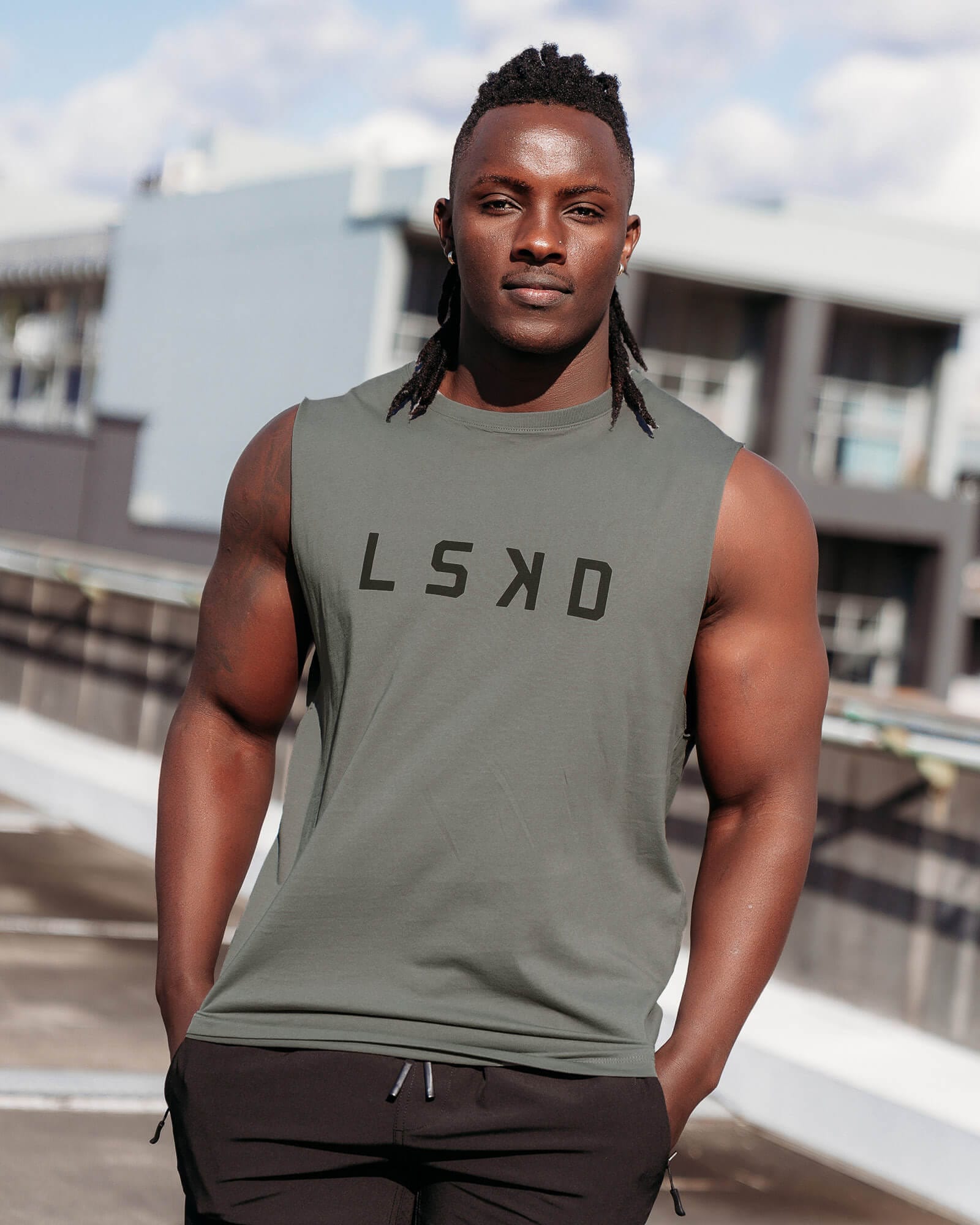 Model wearing Structure Tank - Castlerock