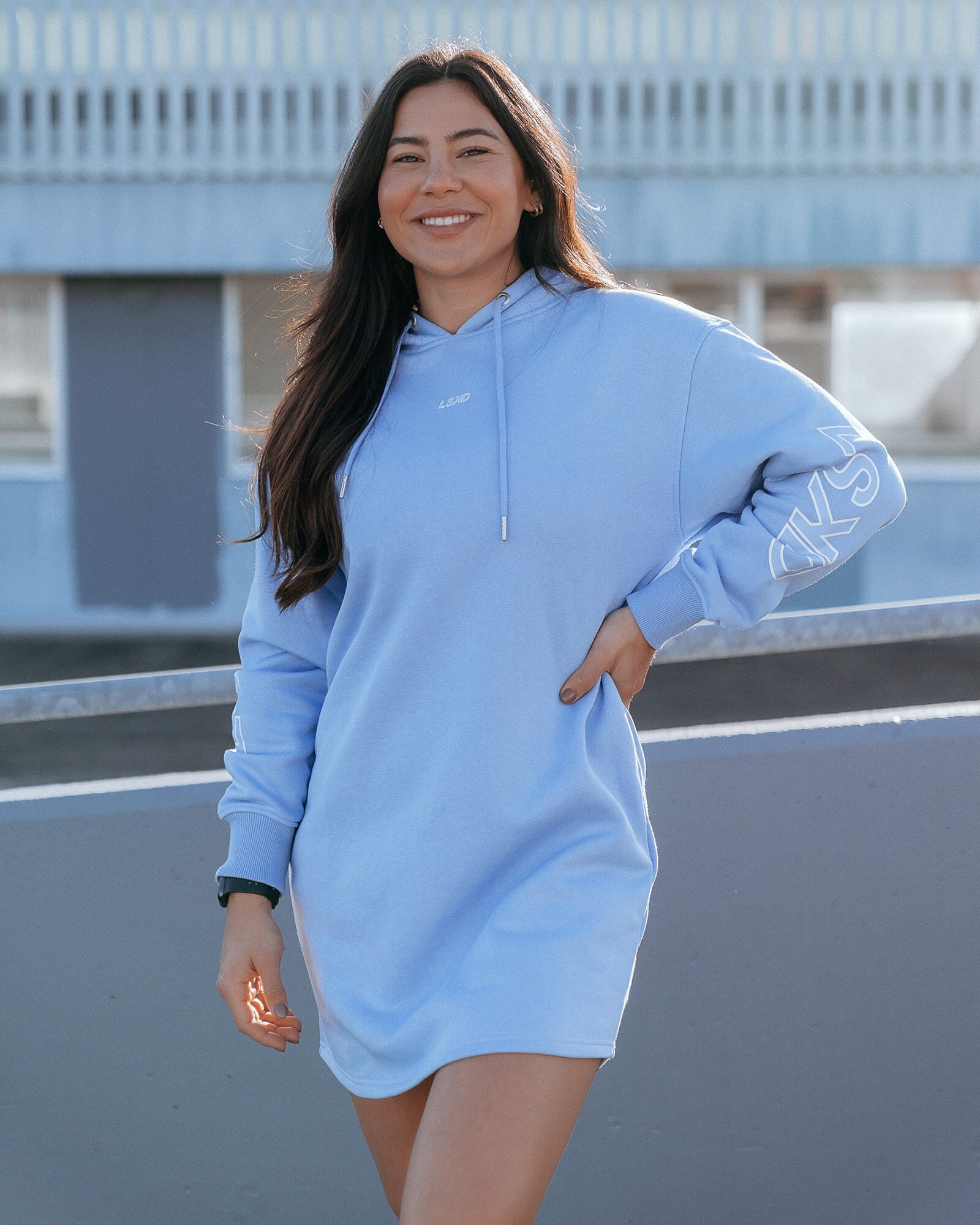 Model wearing DK Hoodie Dress - Soft Blue