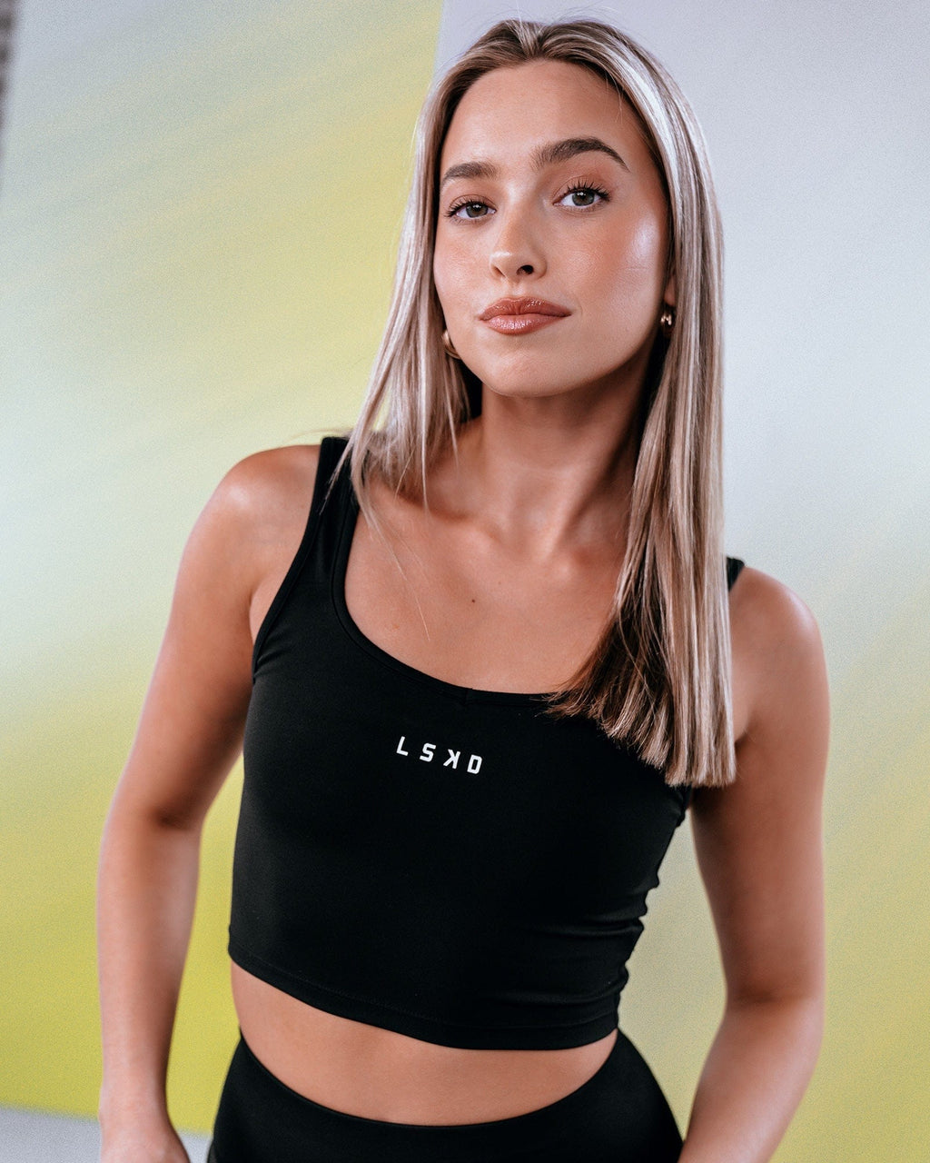 Model wearing Knockout Active Tank - Black