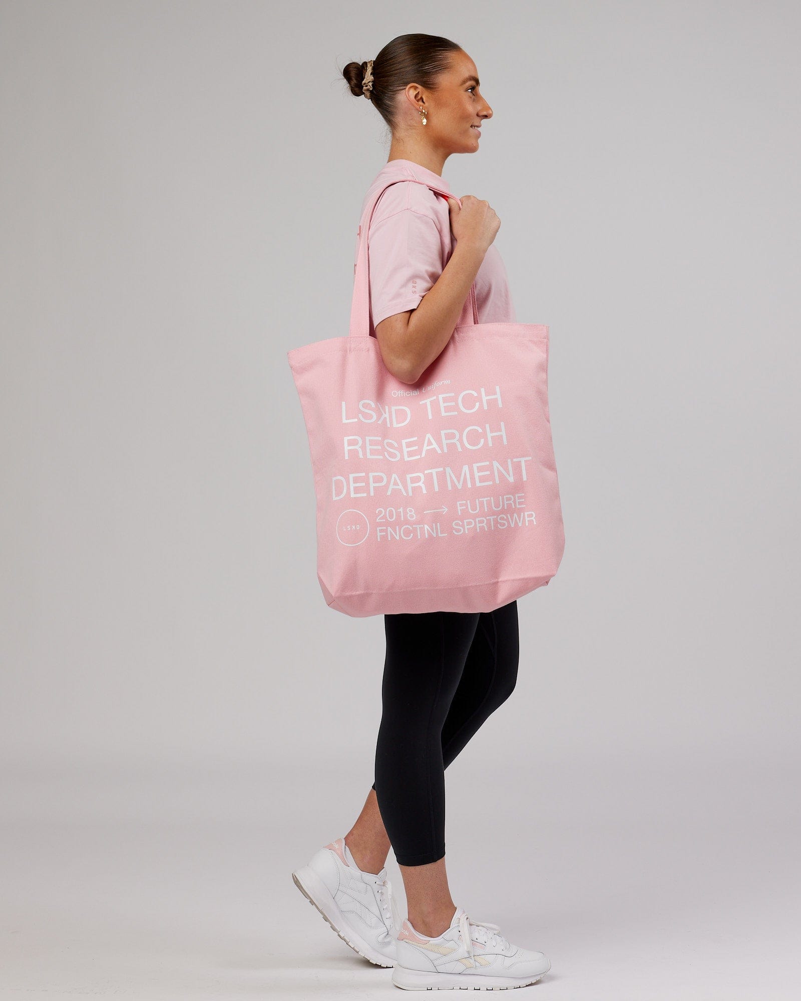 Model wearing LTRD Oversized Tote Bag - Pink Frosting