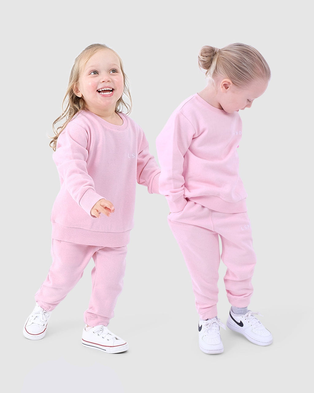 Model wearing Essential Crewneck (00-6) - Petal Pink