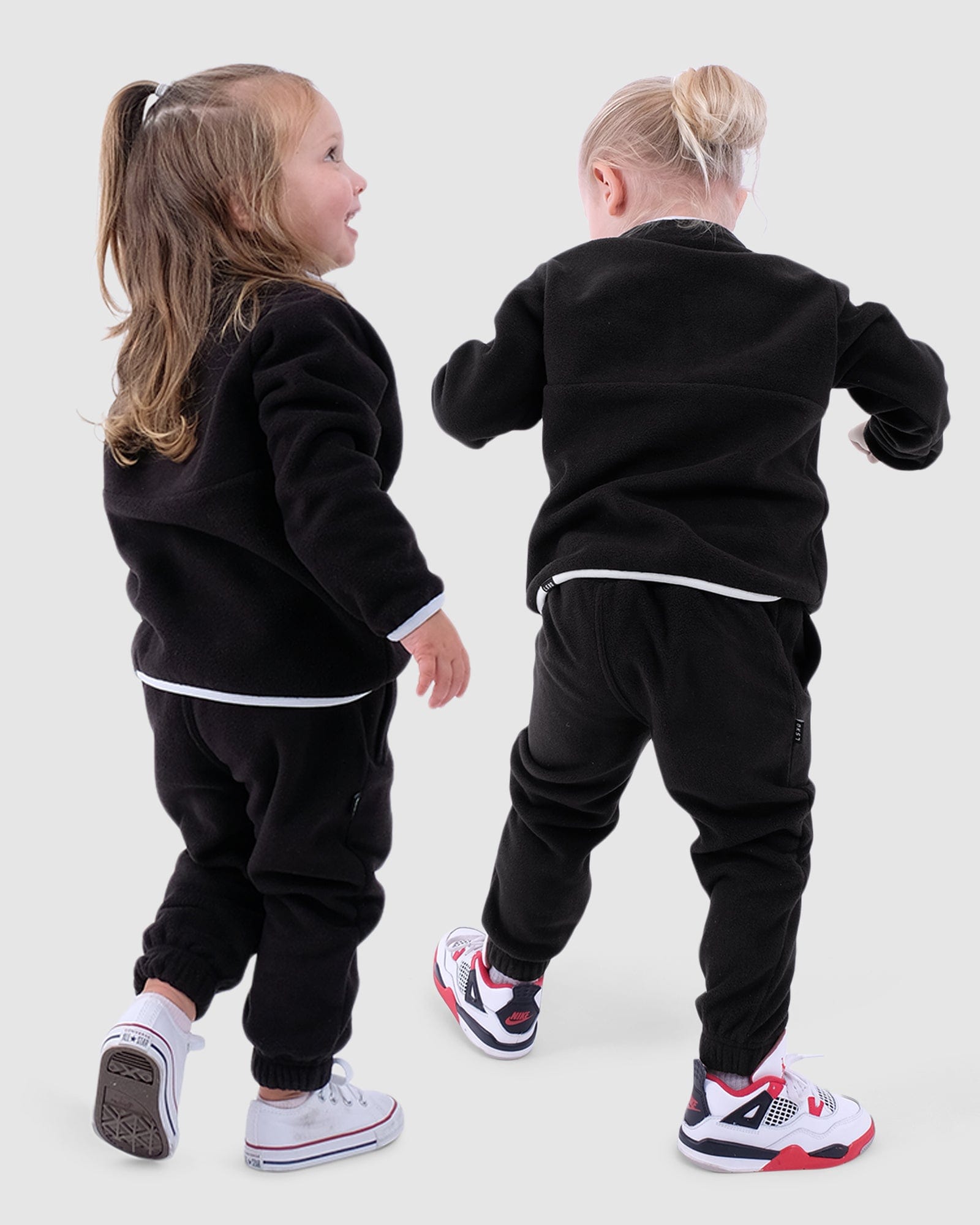 Model wearing Wanderer Trackpant (00-8) - Black