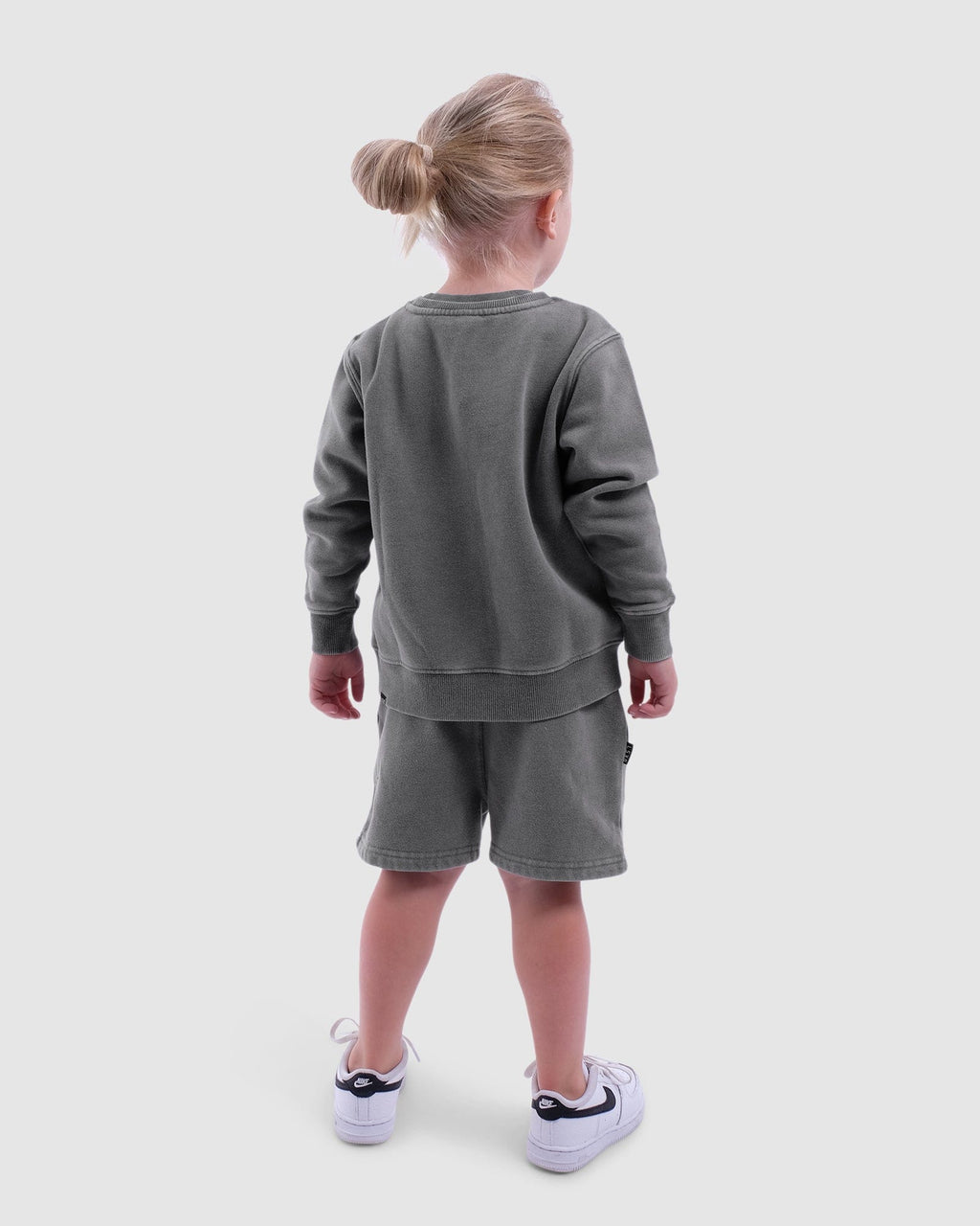 Model wearing Essential Track Short (00-8) - Pilled Pigment Shade